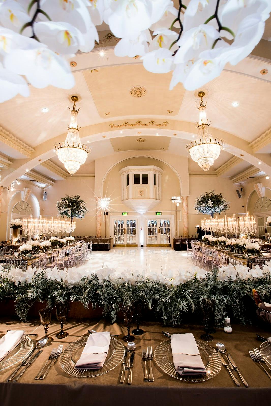 Elegant Emperor Suite with chandeliers, perfect for weddings and corporate events. - Banner