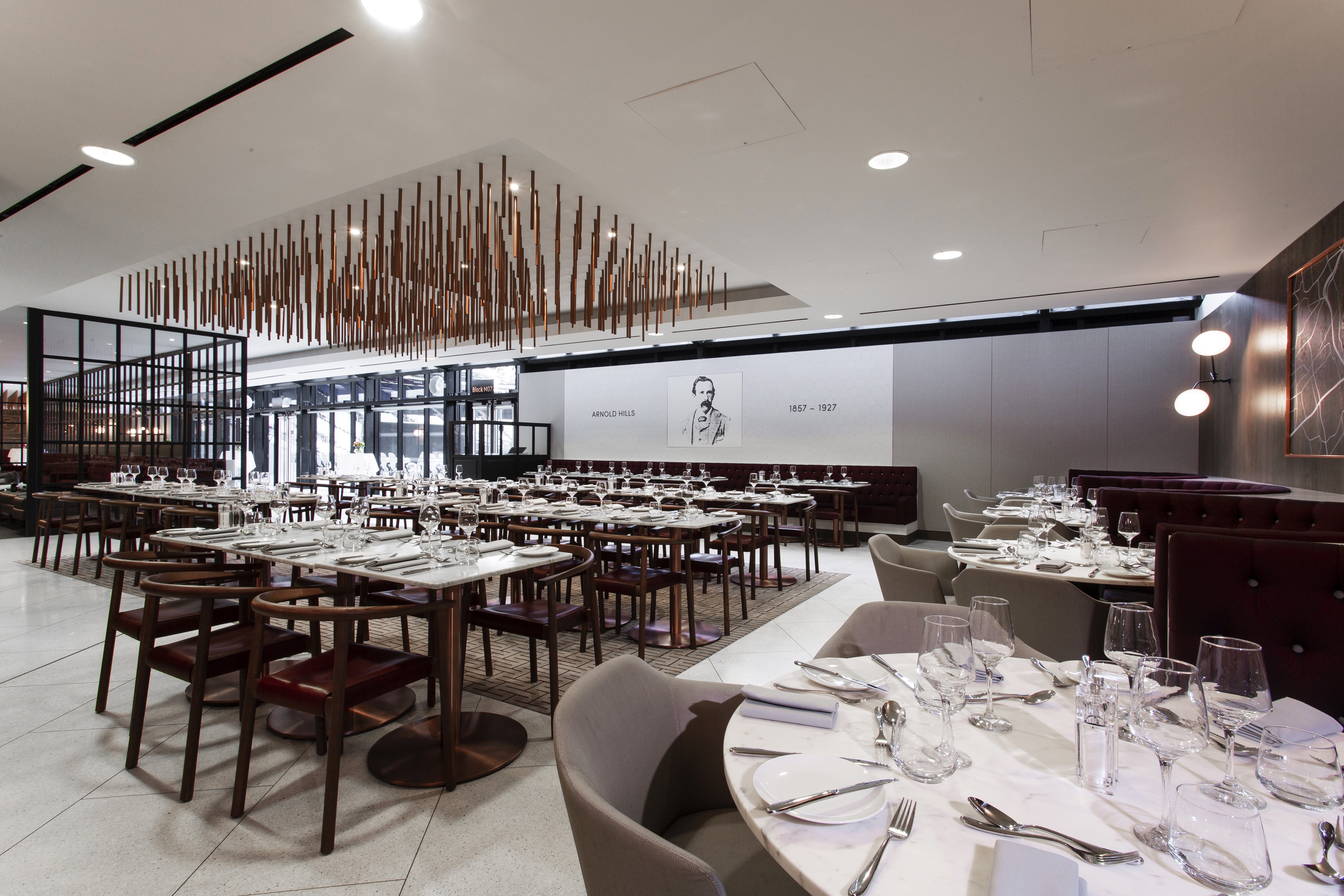 Modern dining space in London Stadium, ideal for corporate events and meetings.