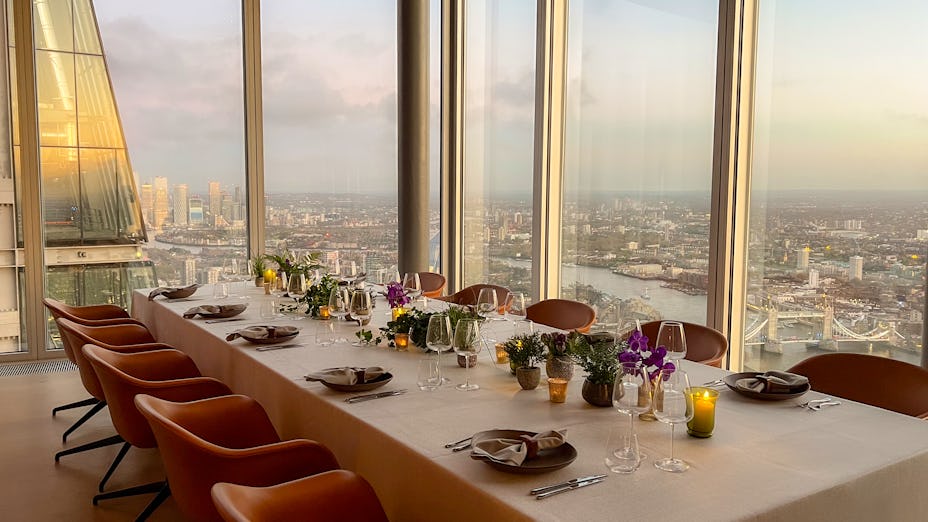 Sophisticated dining setup at The Executive Suites, ideal for corporate events and gatherings. - Banner