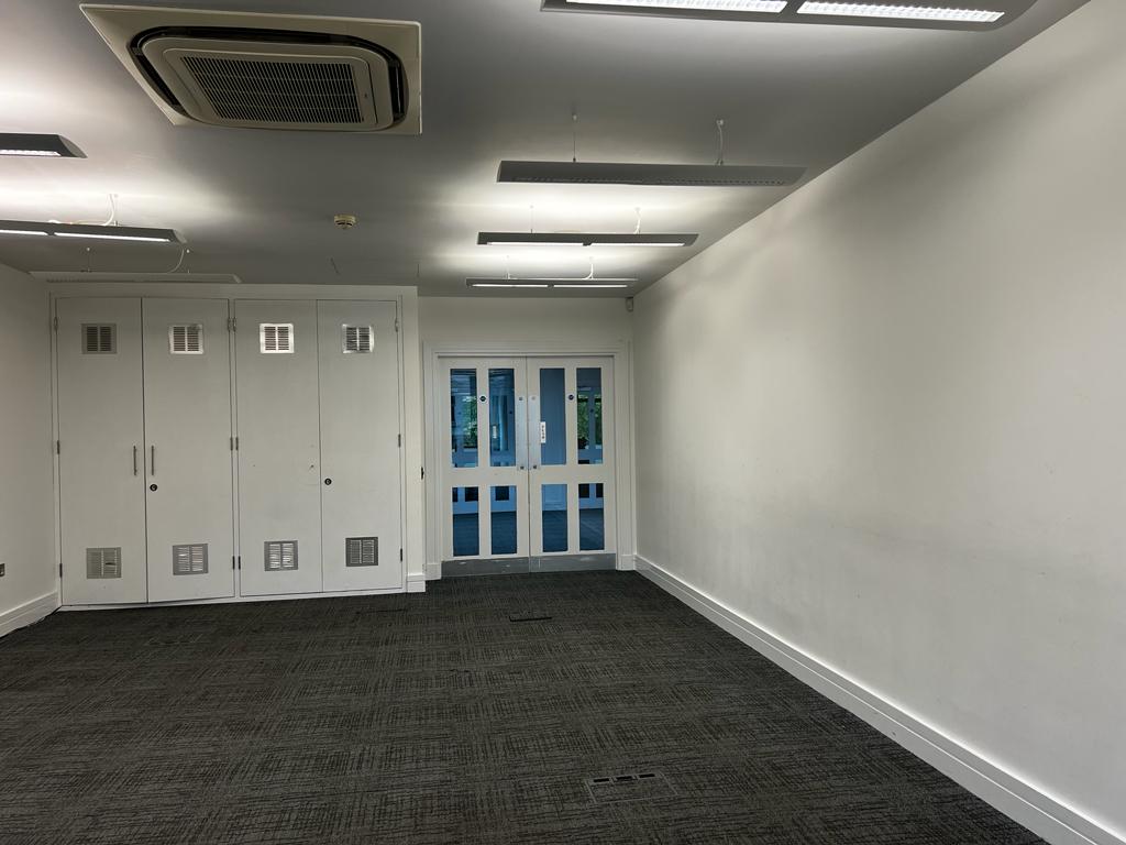 Sapphire Suite meeting room with natural light, perfect for workshops and gatherings.