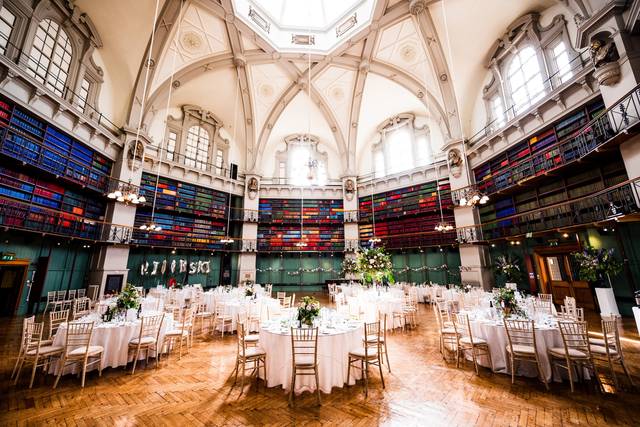 Elegant Octagon venue with round tables, ideal for weddings and corporate events. - Banner