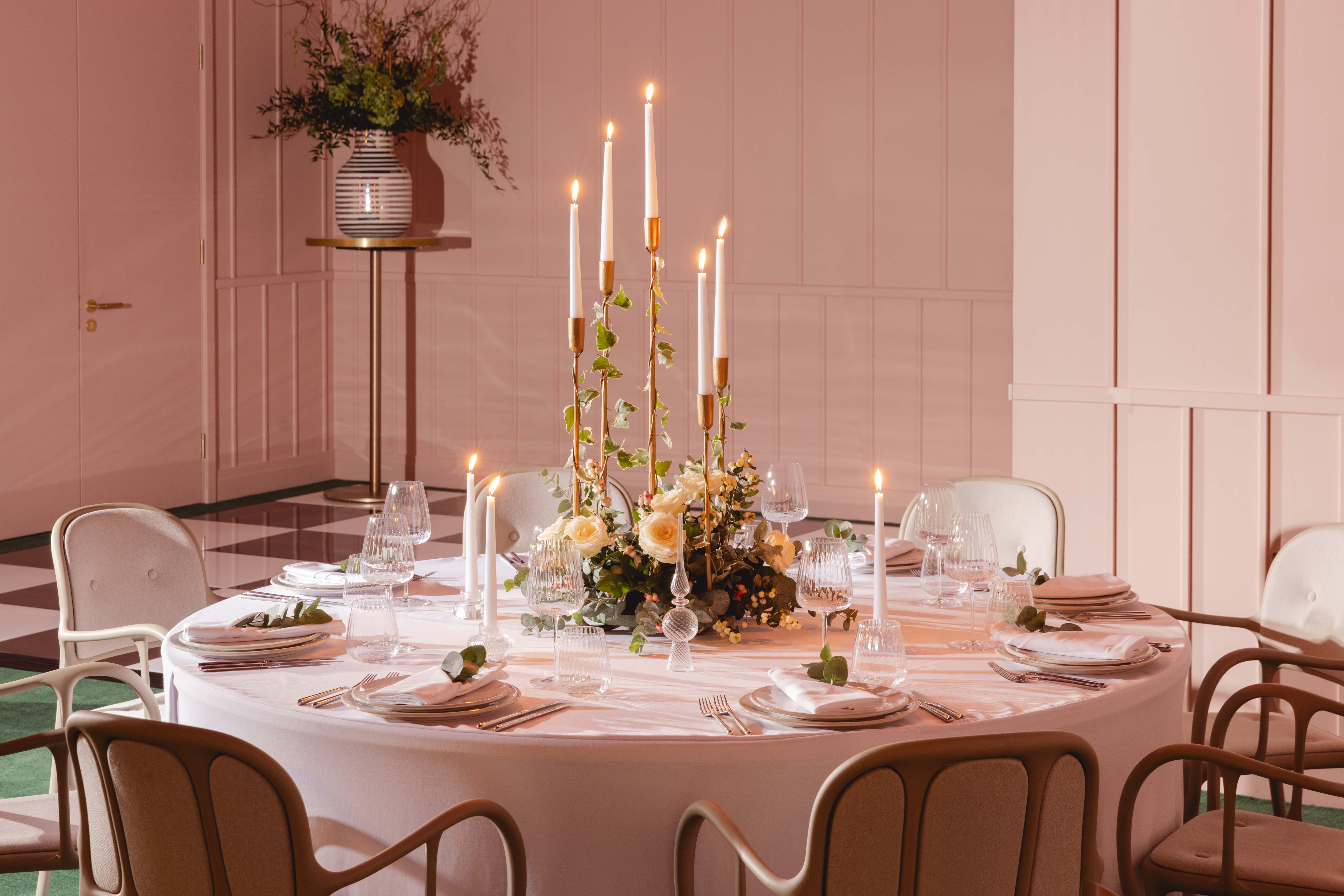 Elegant round table with floral centerpiece for upscale events at art'otel London.