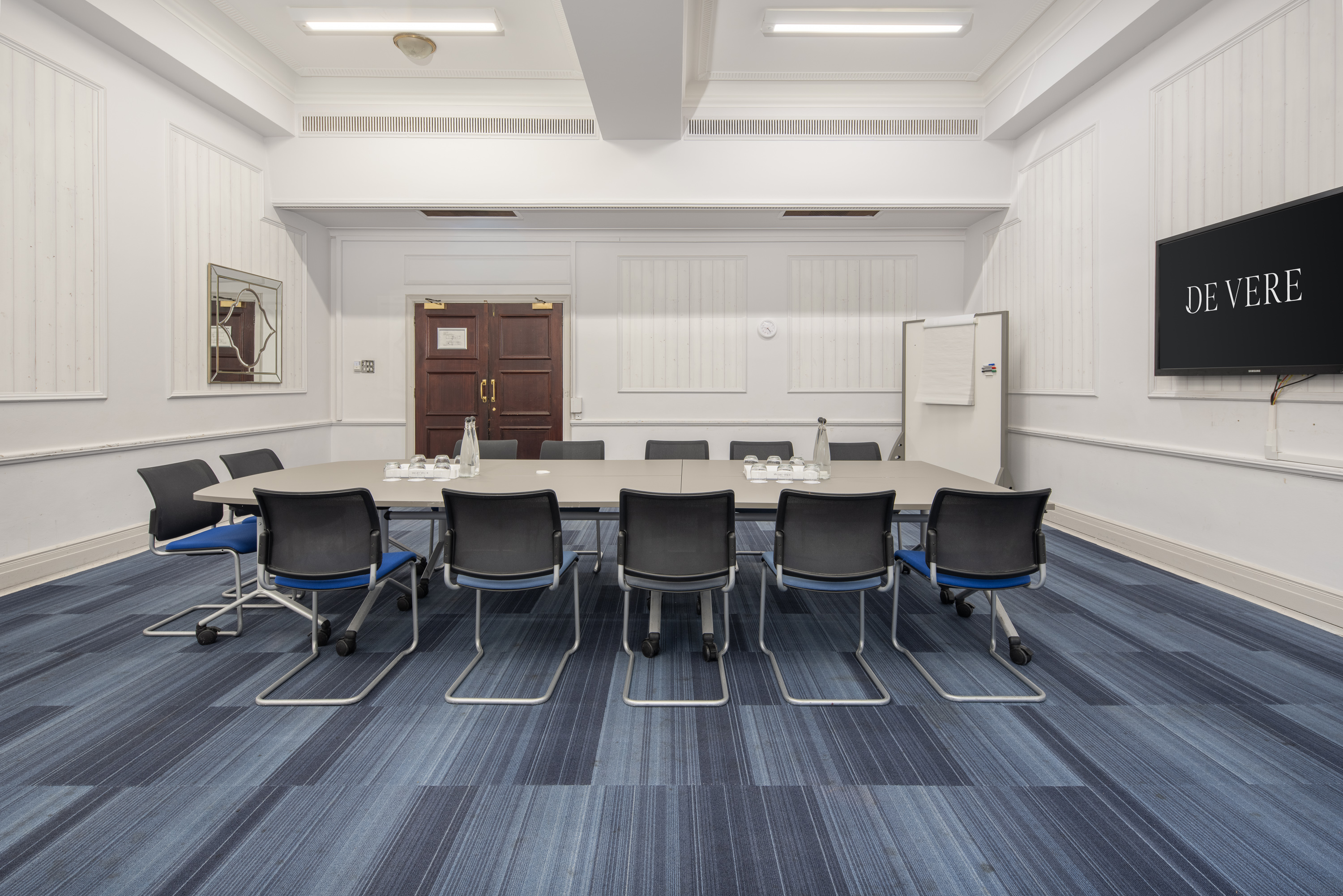 Durham Suite boardroom with ergonomic seating for small corporate meetings and conferences.