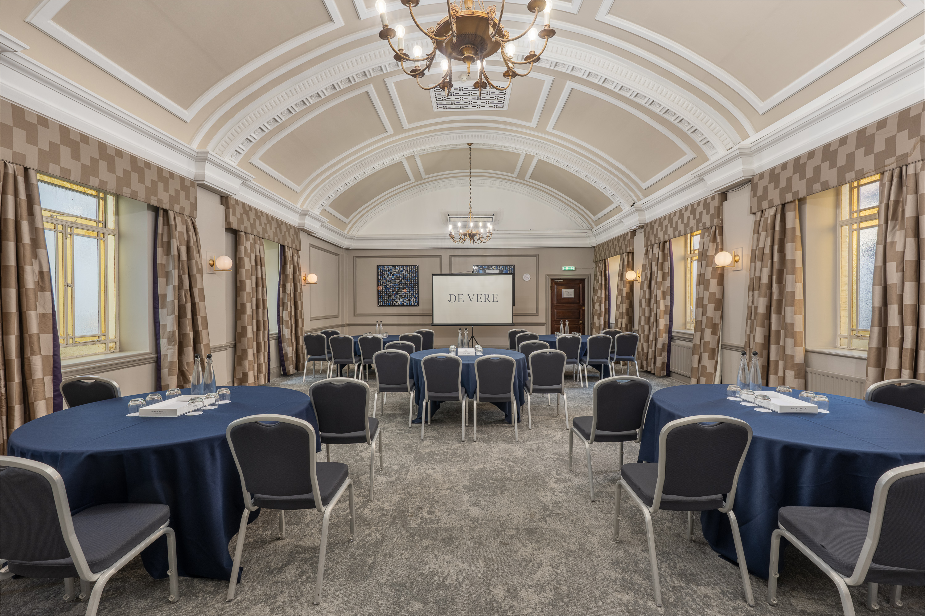 Ampthill Suite boardroom with vaulted ceilings for corporate meetings and workshops.