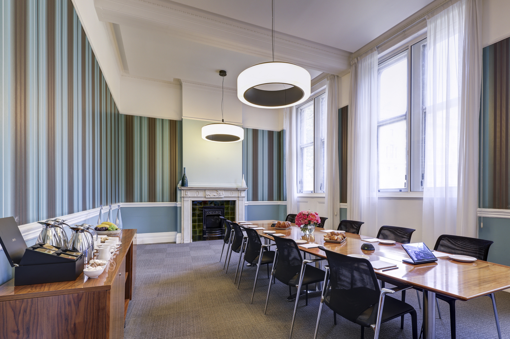 Meeting room in Surveyors House, NYC, with long table and natural light for professional events.