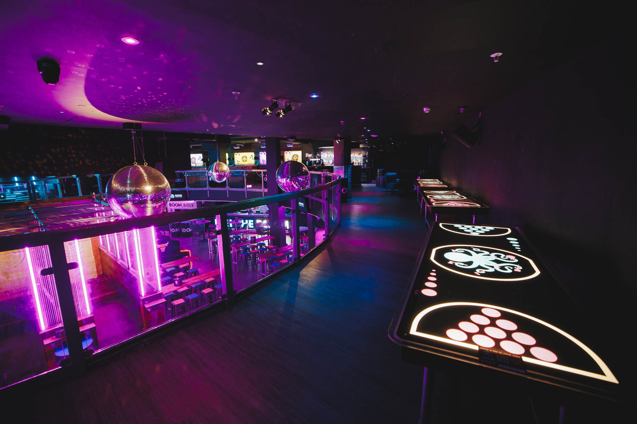 "Vibrant event space in Boom Battle Bar Manchester for private hire, ideal for gatherings." - Banner