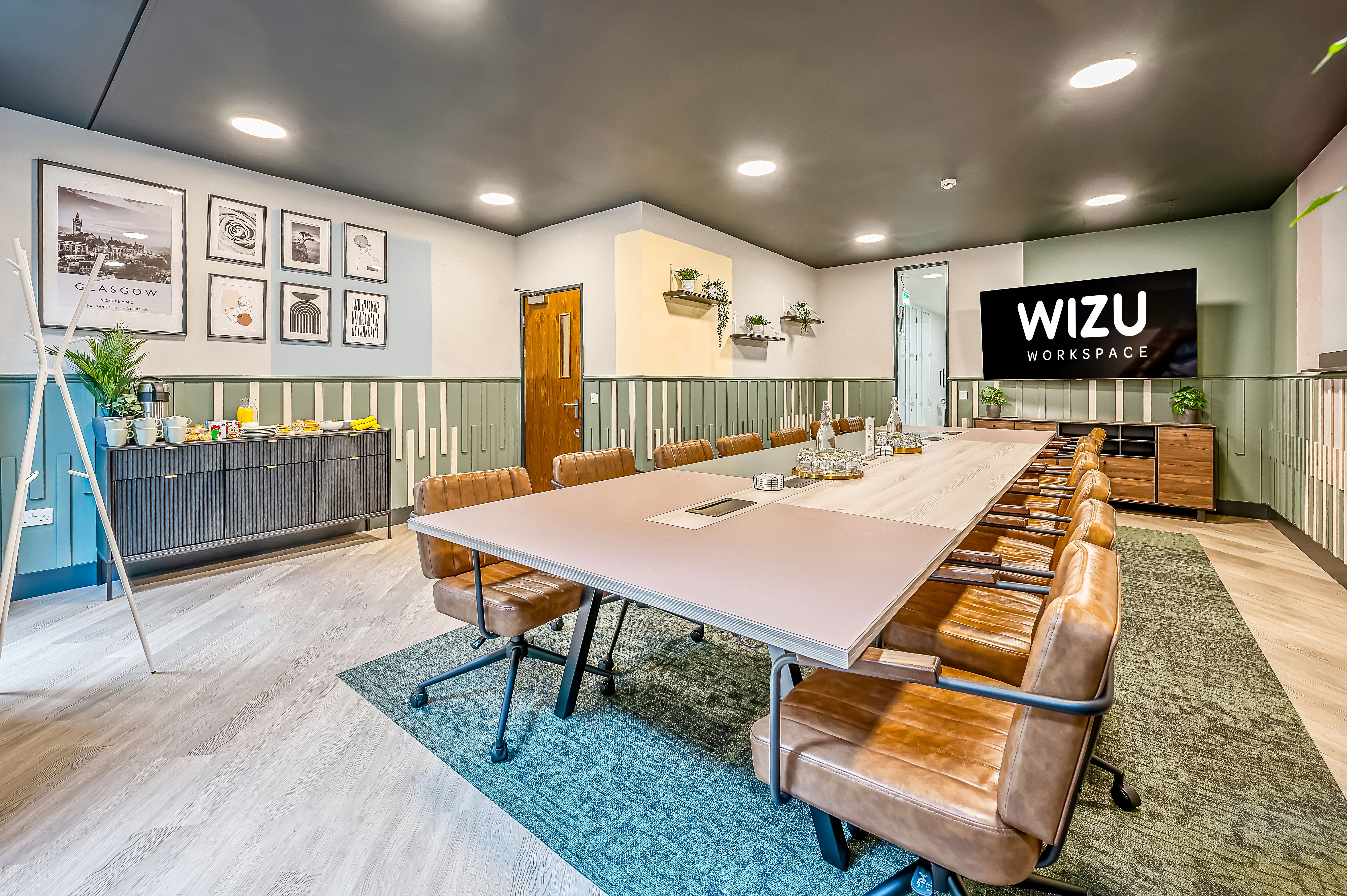Modern meeting room in Wizu Workspace, ideal for hybrid meetings and collaboration. - Banner