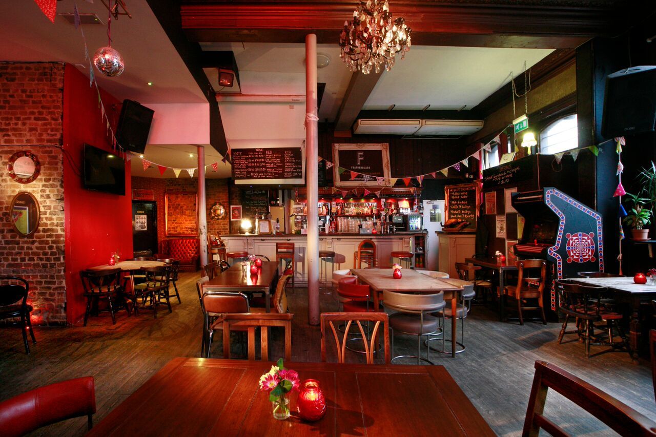 Karaoke room at Star of Bethnal Green with rustic decor, ideal for casual events and gatherings.