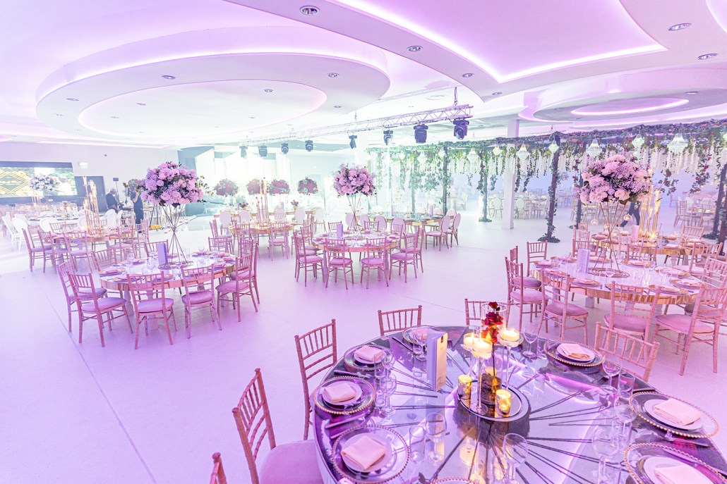 Elegant Banqueting Suite with round tables, ideal for weddings and corporate events. - Banner