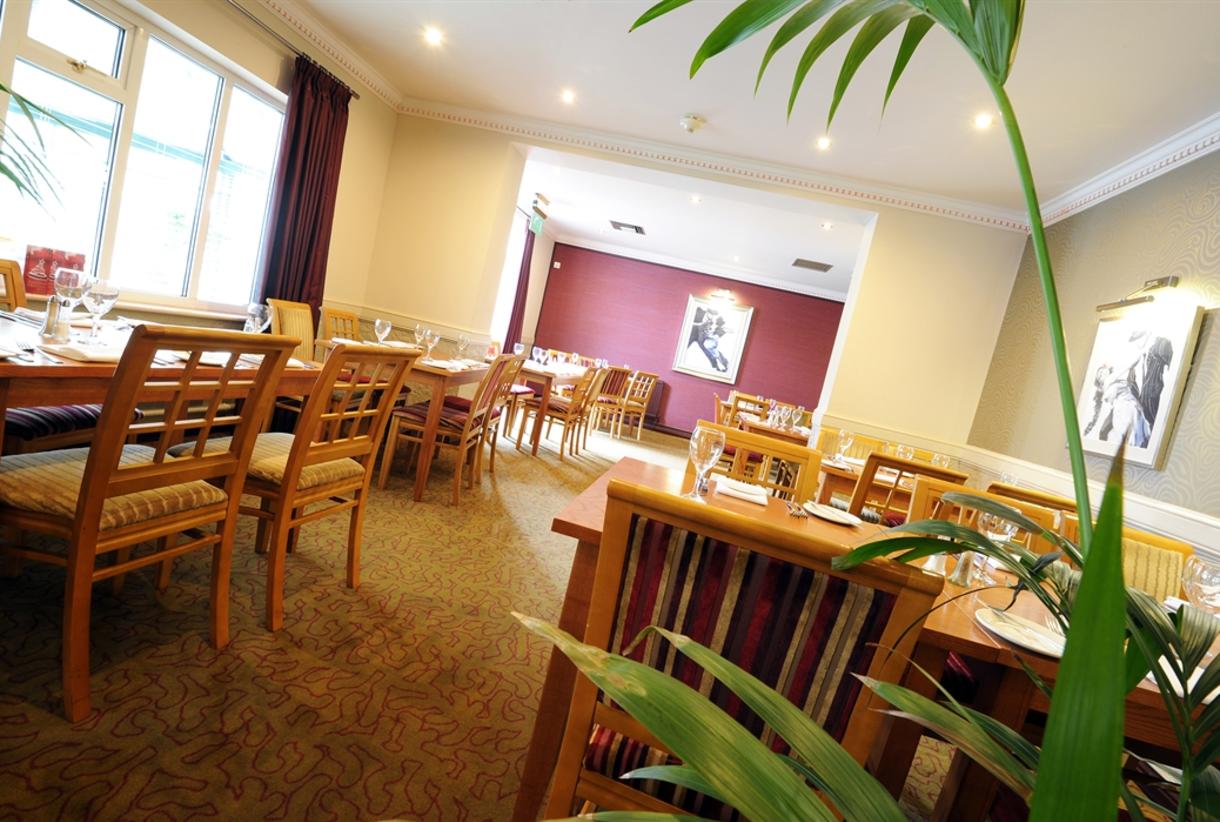 Westley Suite dining space with elegant decor for intimate meetings and events.