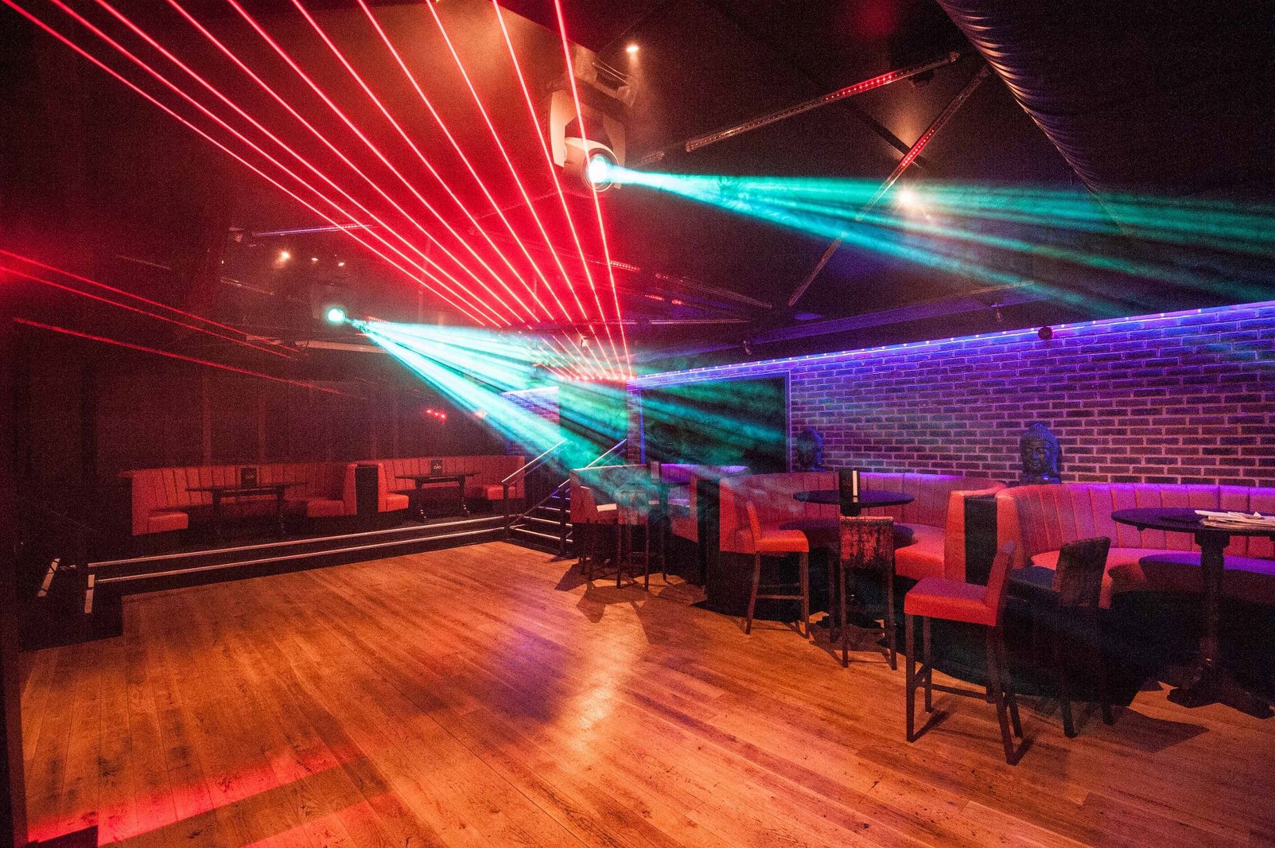 Vibrant event space with dynamic laser lighting for parties and corporate events in Birmingham. - Banner
