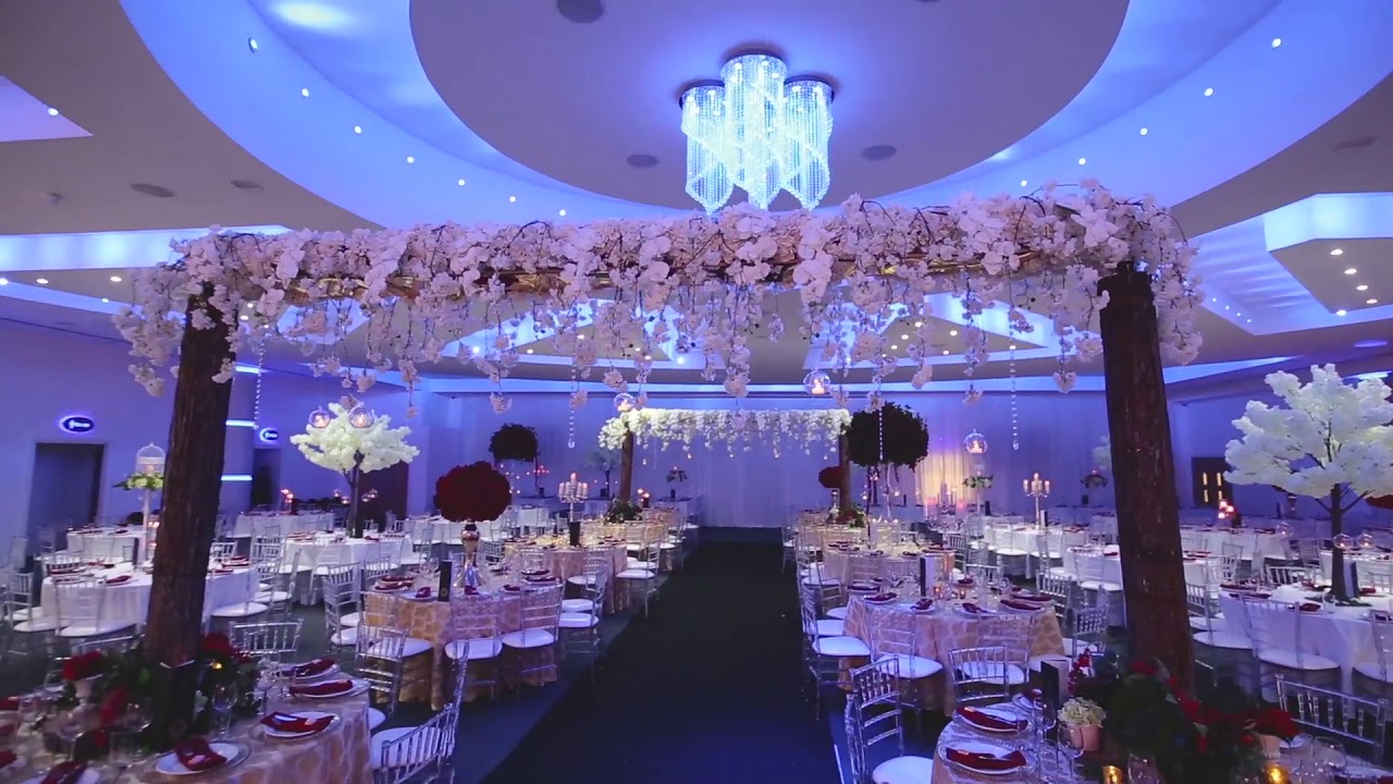 Elegant Grand Ballroom with round tables, perfect for weddings and corporate events.