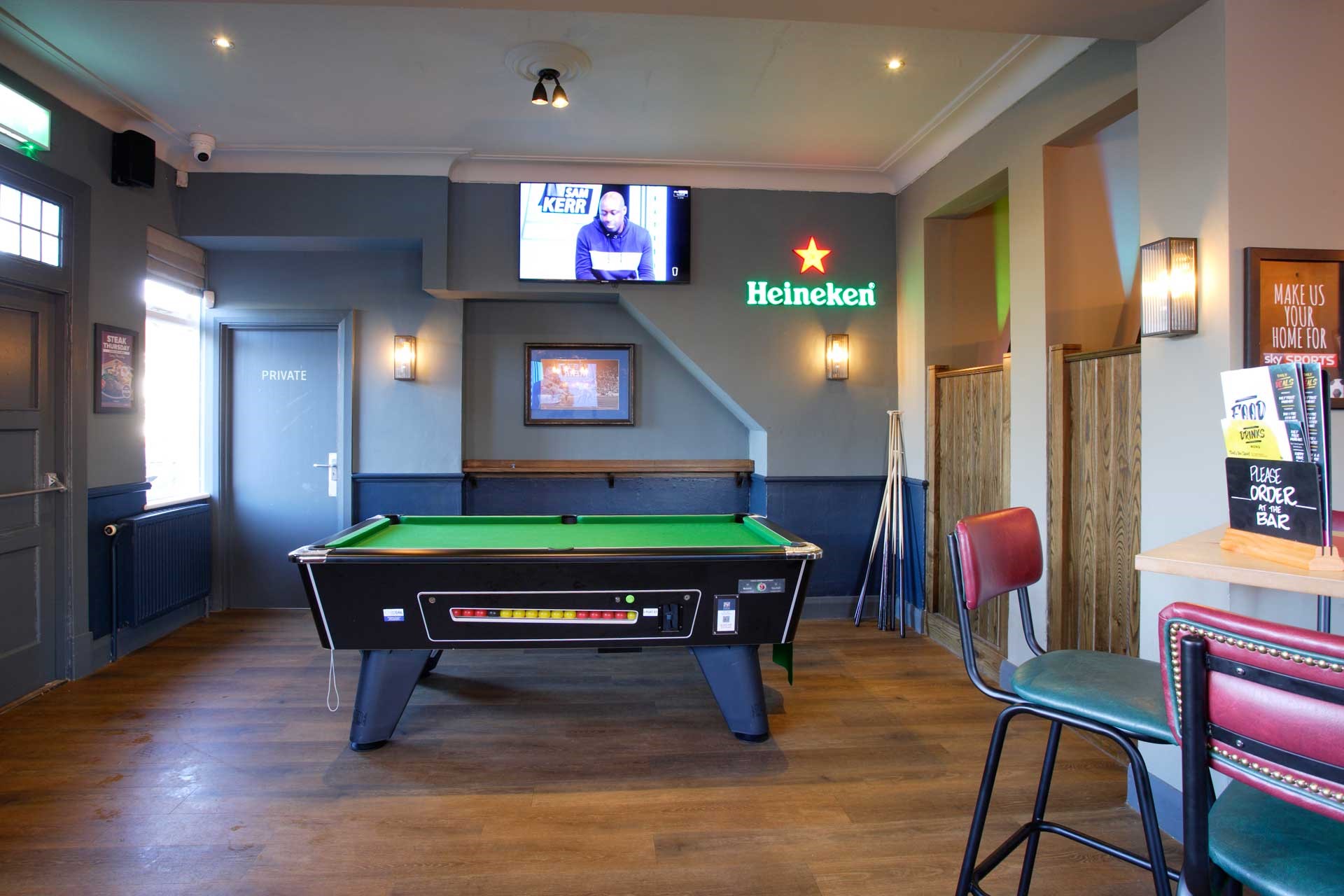 Casual lounge with pool table at The Hunting Tree for networking events and team-building.