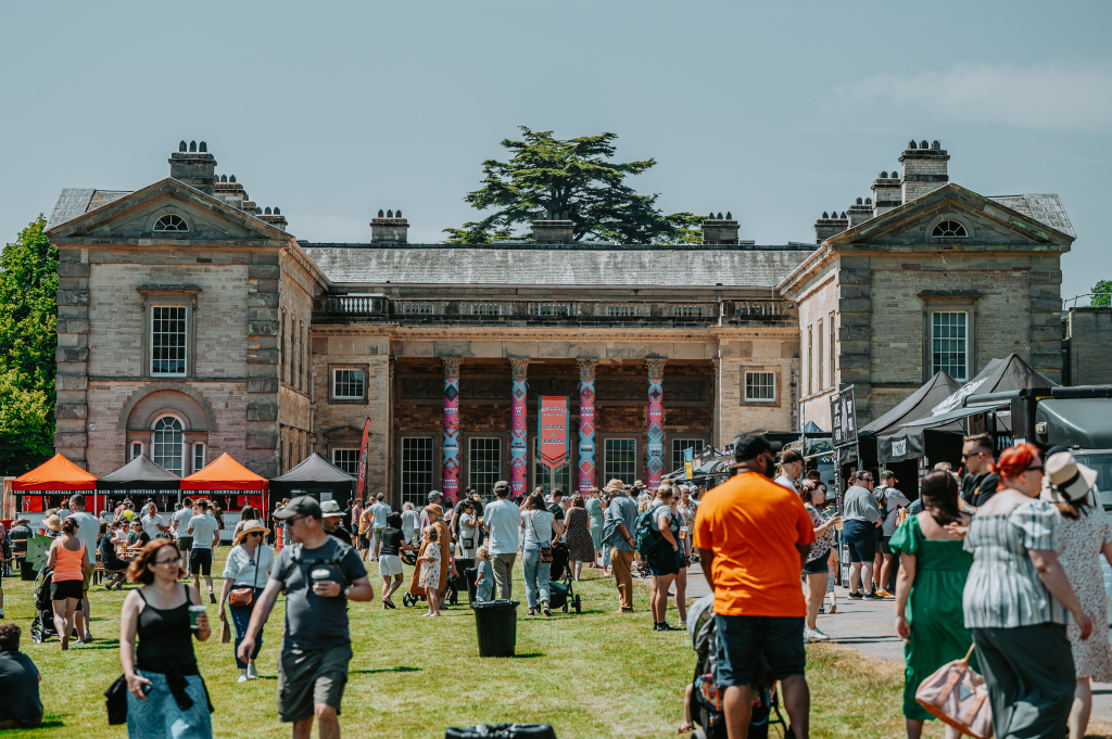 Digbeth Dining Club outdoor festival with vibrant food stalls and lively atmosphere. - Banner