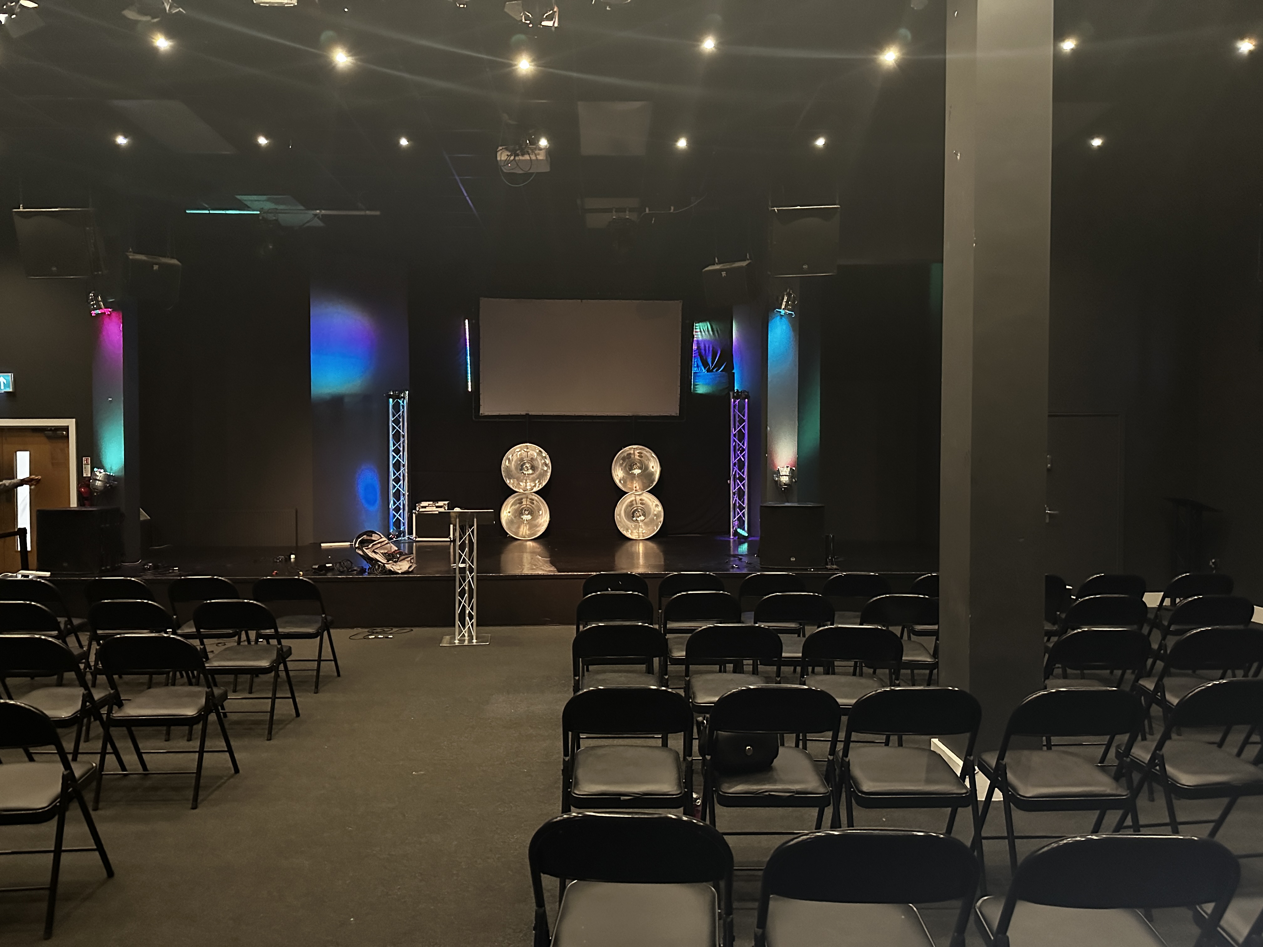 Versatile event space at The Forge, equipped for presentations and performances.