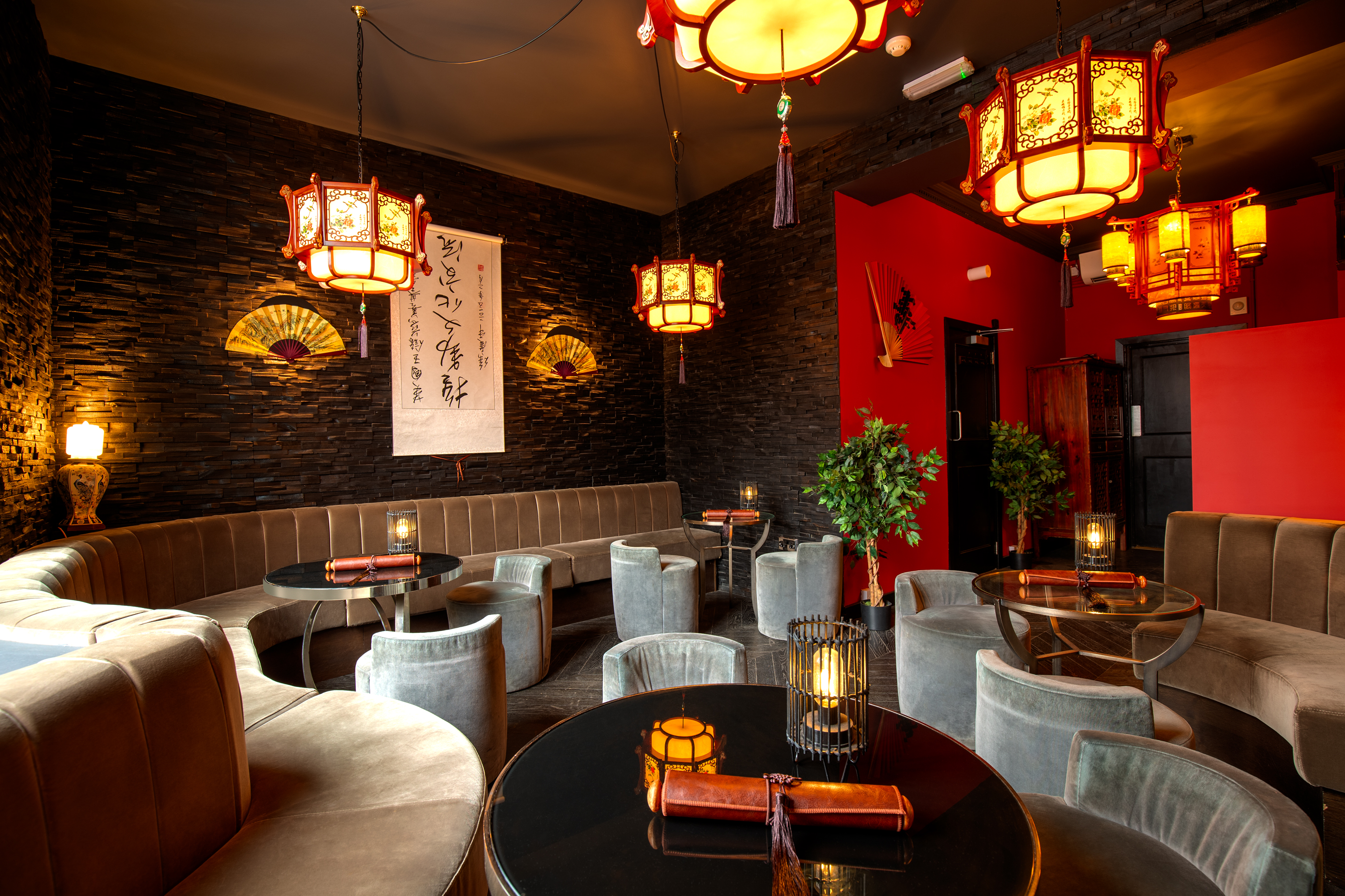Stylish Shanghai Cocktail Lounge with warm lighting, ideal for upscale events and gatherings. - Banner
