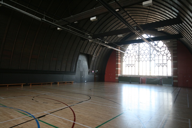 Spacious Sports Hall at The Harrow Club, ideal for events and gatherings.