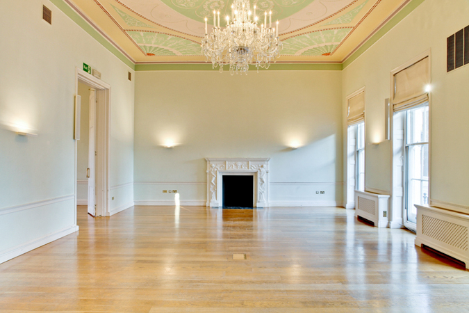 Elegant meeting room with chandelier at Asia House, perfect for events and workshops.