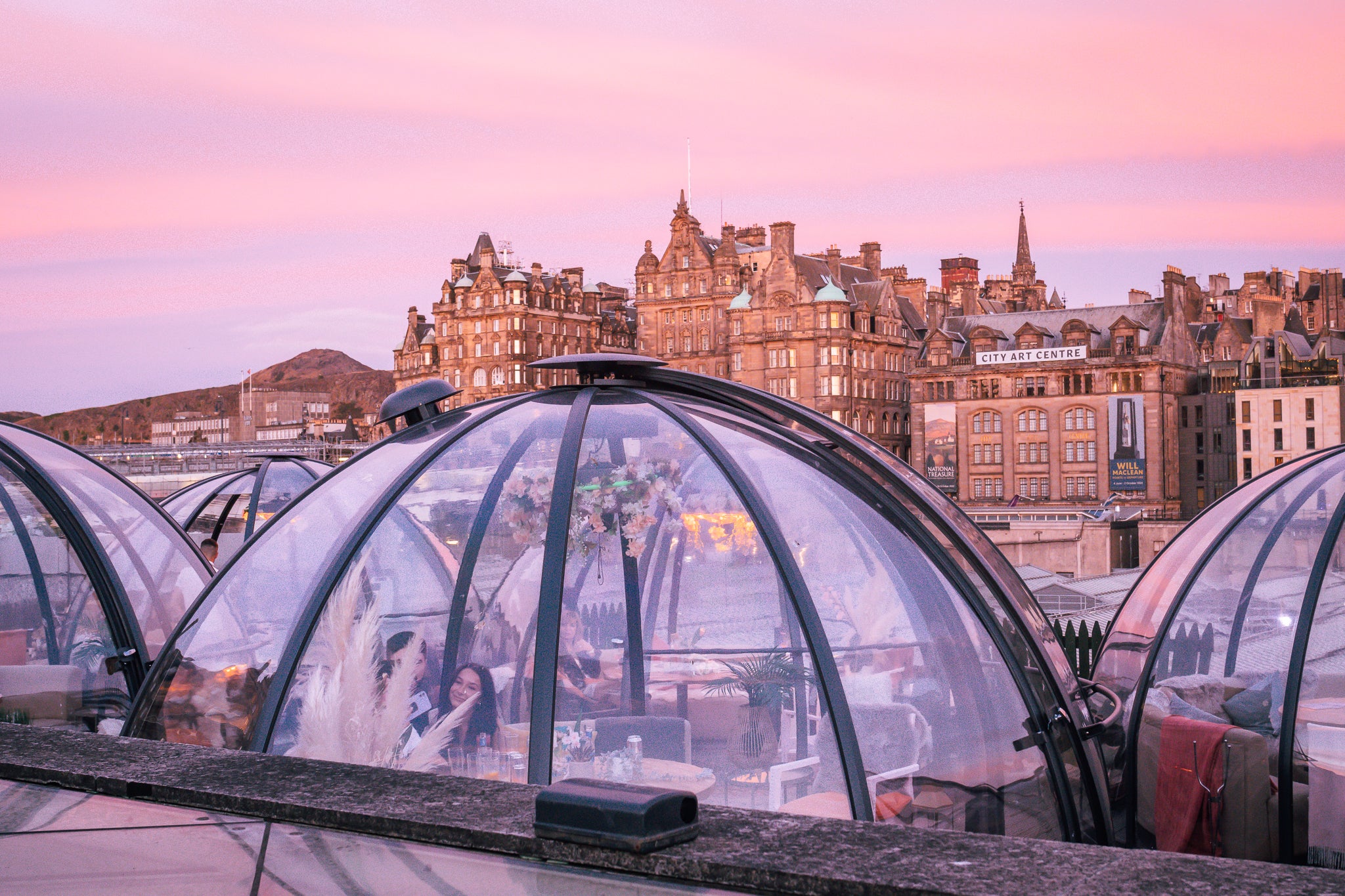 Rooftop cocktail bar in The Dome Edinburgh with transparent domes, perfect for events.