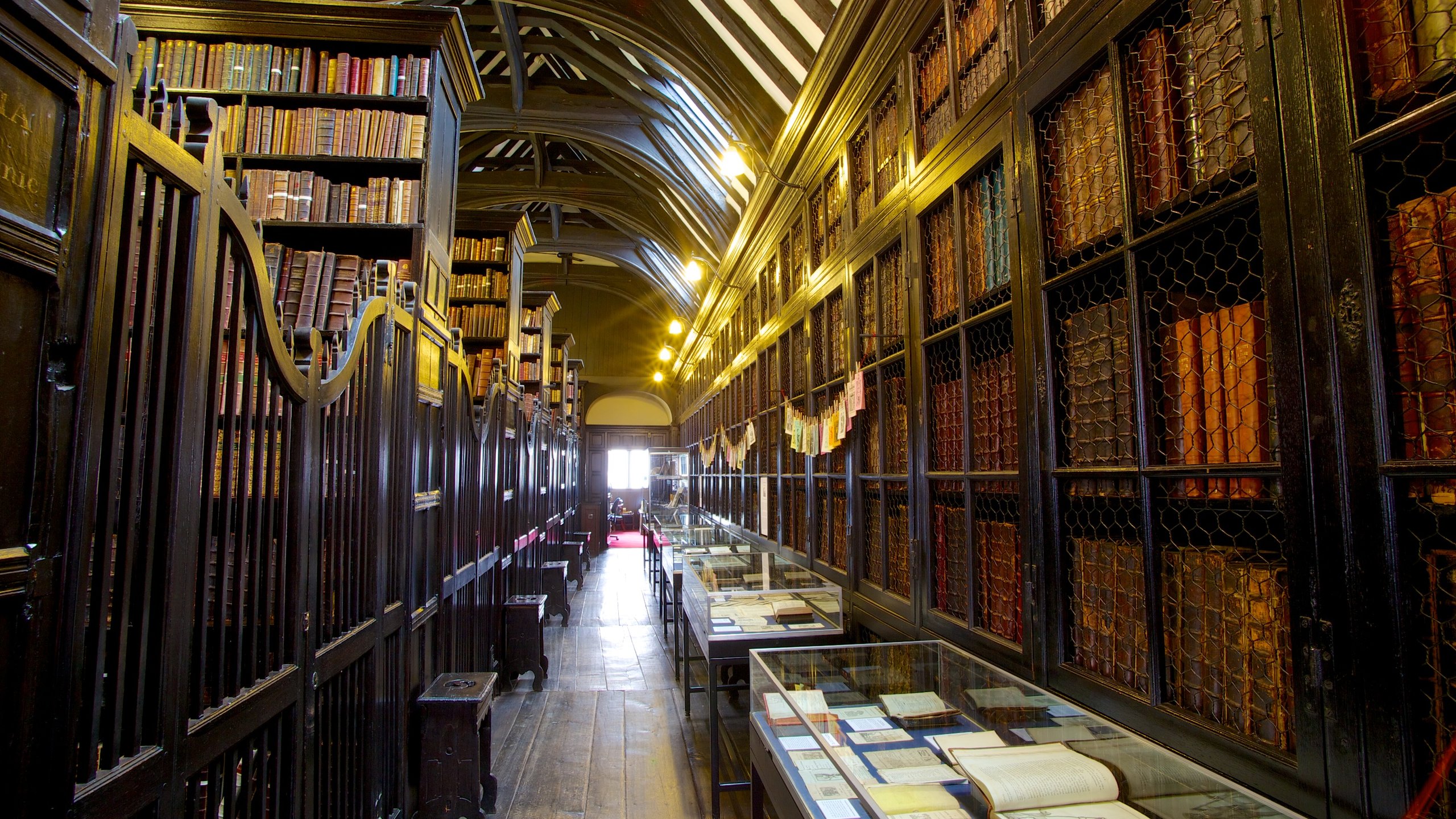 Chetham's Library with towering bookshelves, perfect for literary events and workshops. - Banner