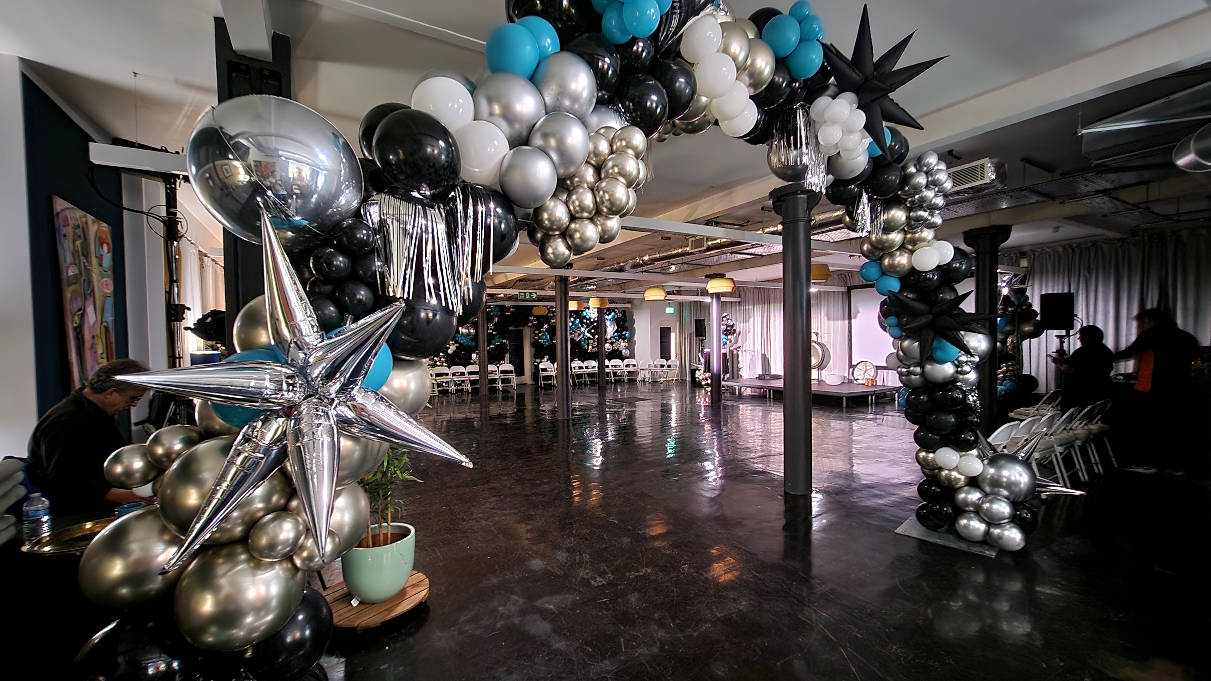 Underwood Flagship Venue with metallic balloon arch, ideal for corporate events and celebrations.