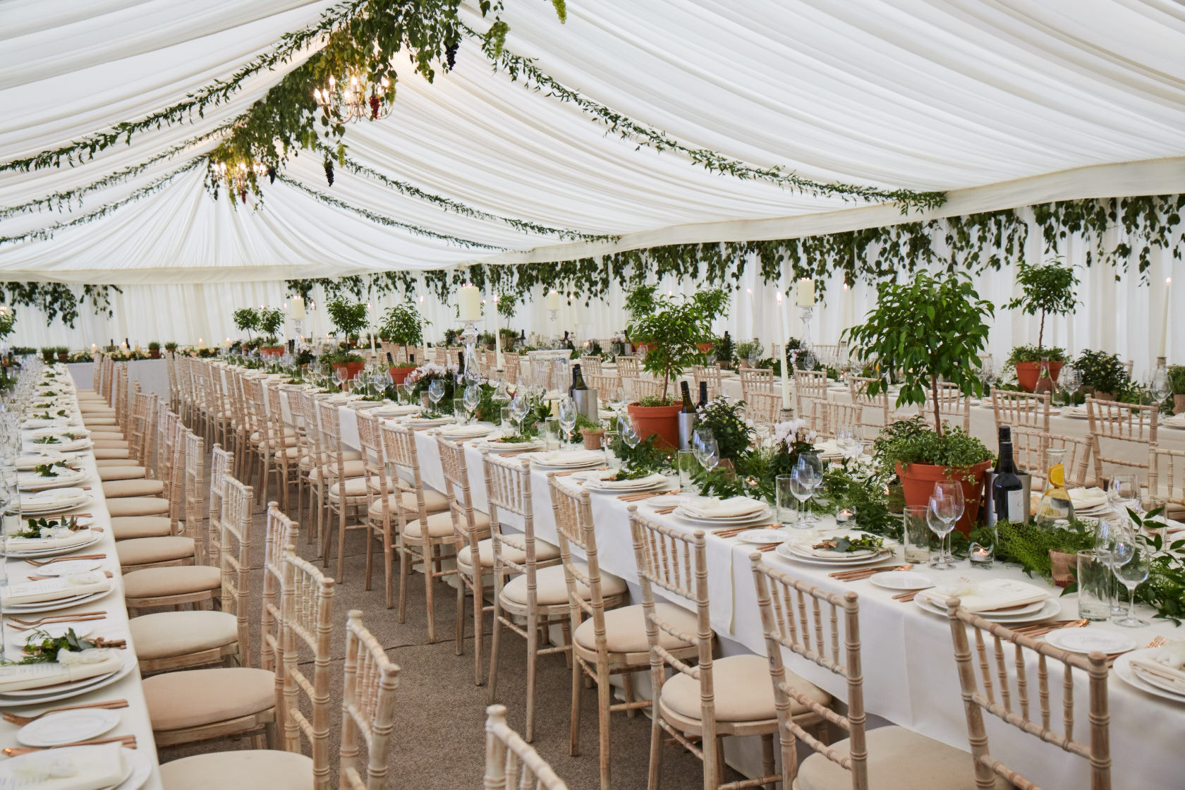 Elegant Belair House ballroom marquee with greenery for luxury wedding or corporate event.