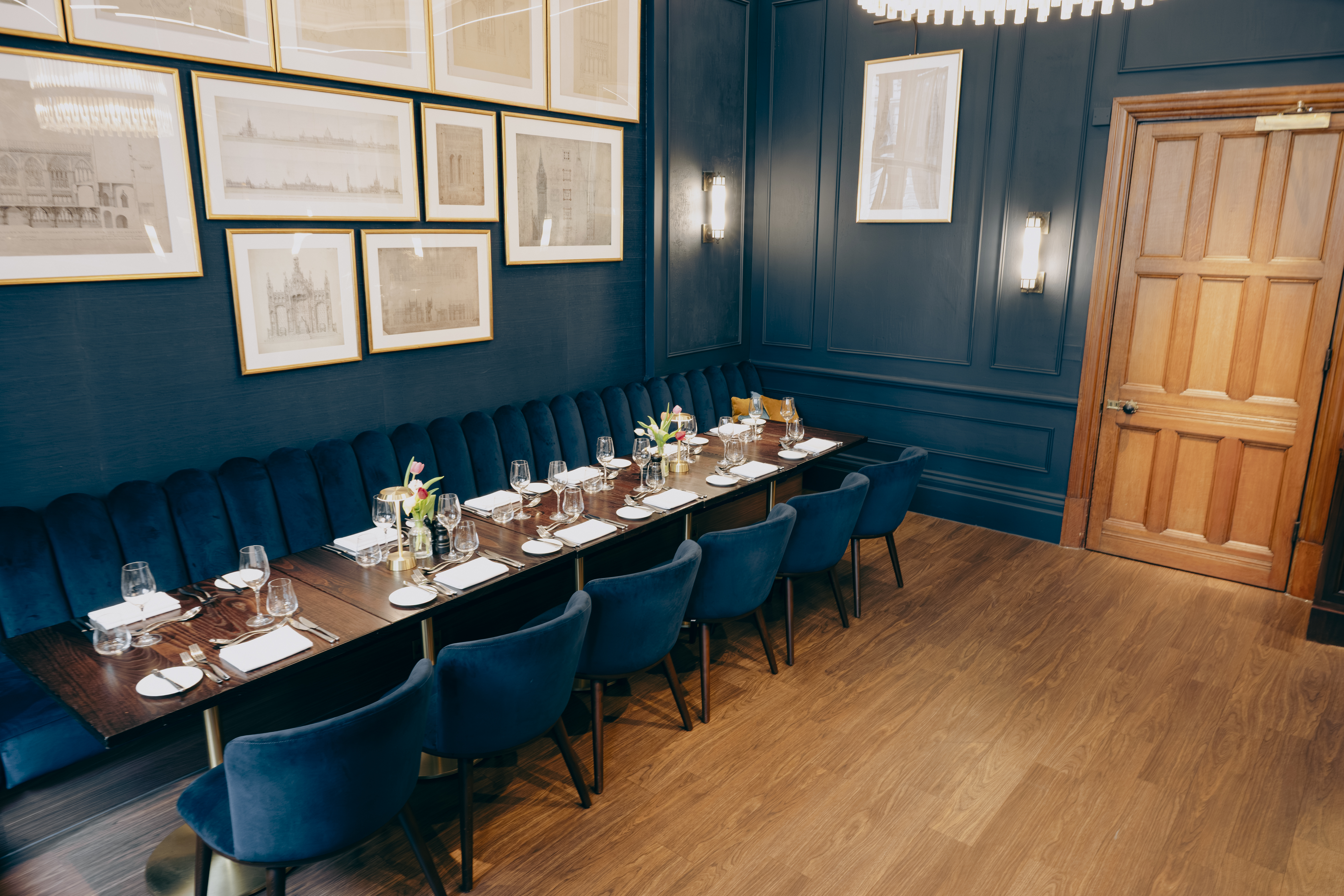 Blue velvet private dining room for exclusive board meetings and intimate events.
