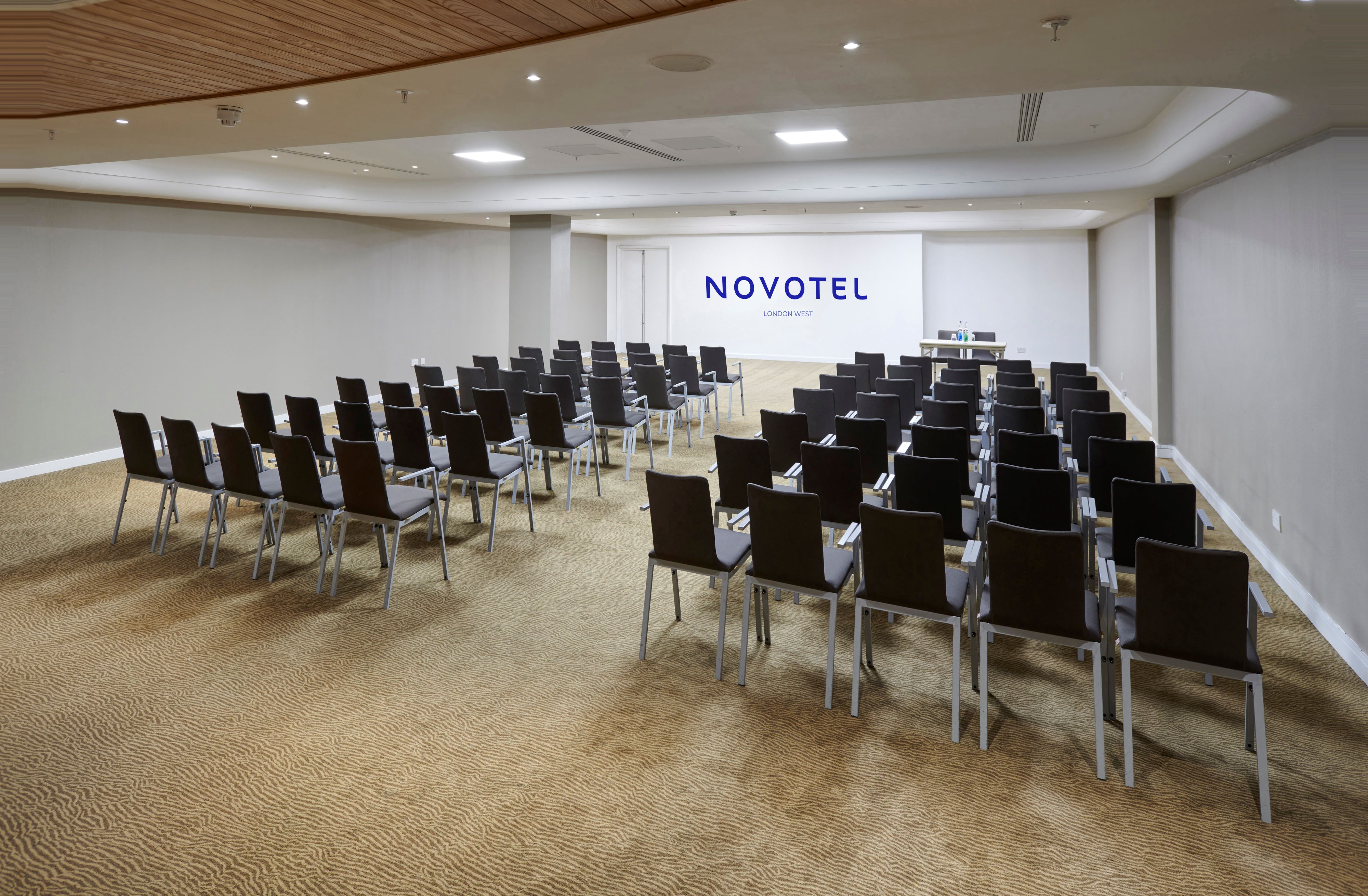 Conference room at Novotel London West with modern chairs for meetings and presentations.