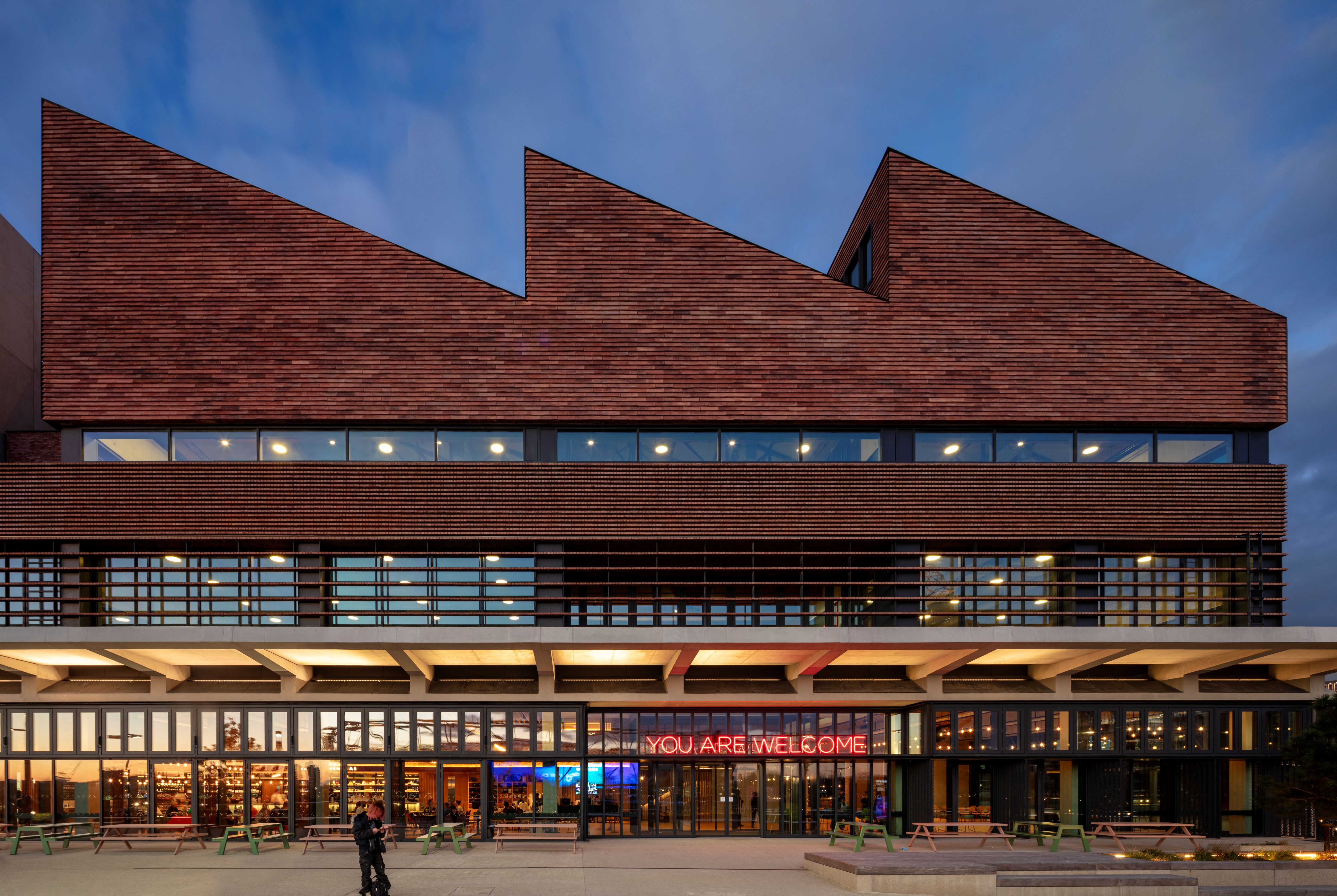 Modern auditorium at Sadler's Wells East for versatile events with striking architecture. - Banner