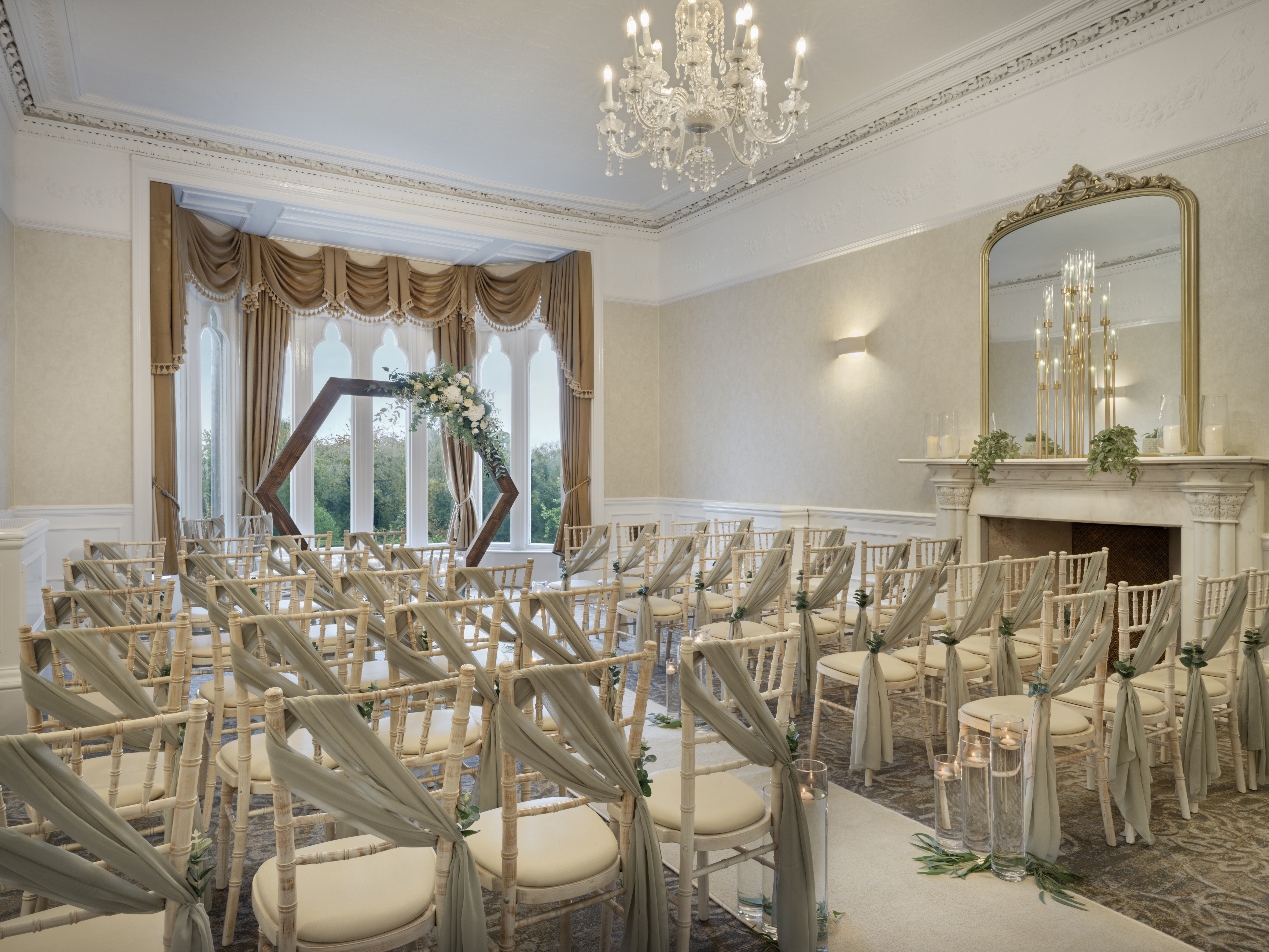 Elegant Morley Room at Delta Hotels, featuring floral arch for weddings and events.