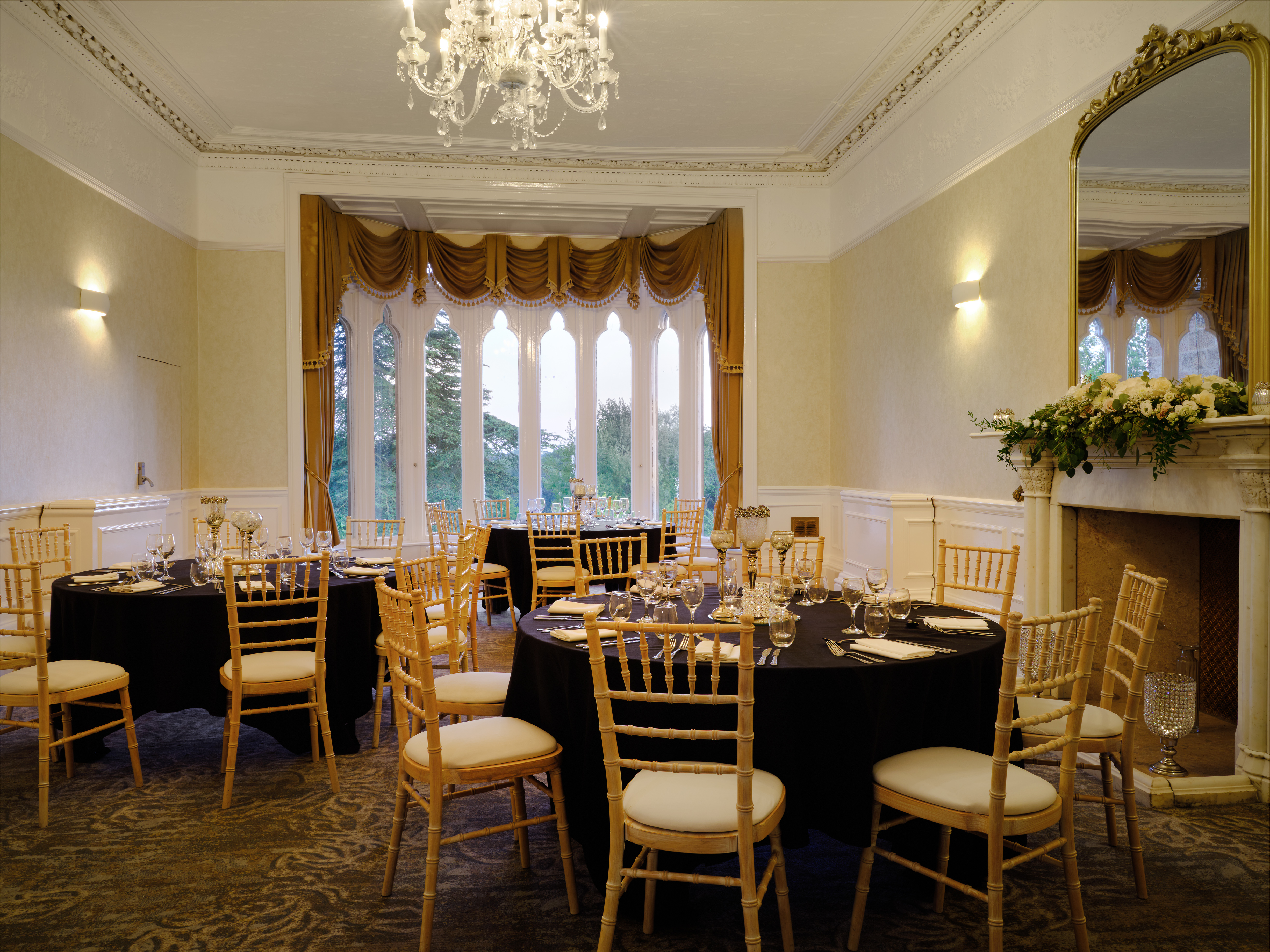 Elegant Morley Room dining setup with black linens, ideal for weddings and corporate events.