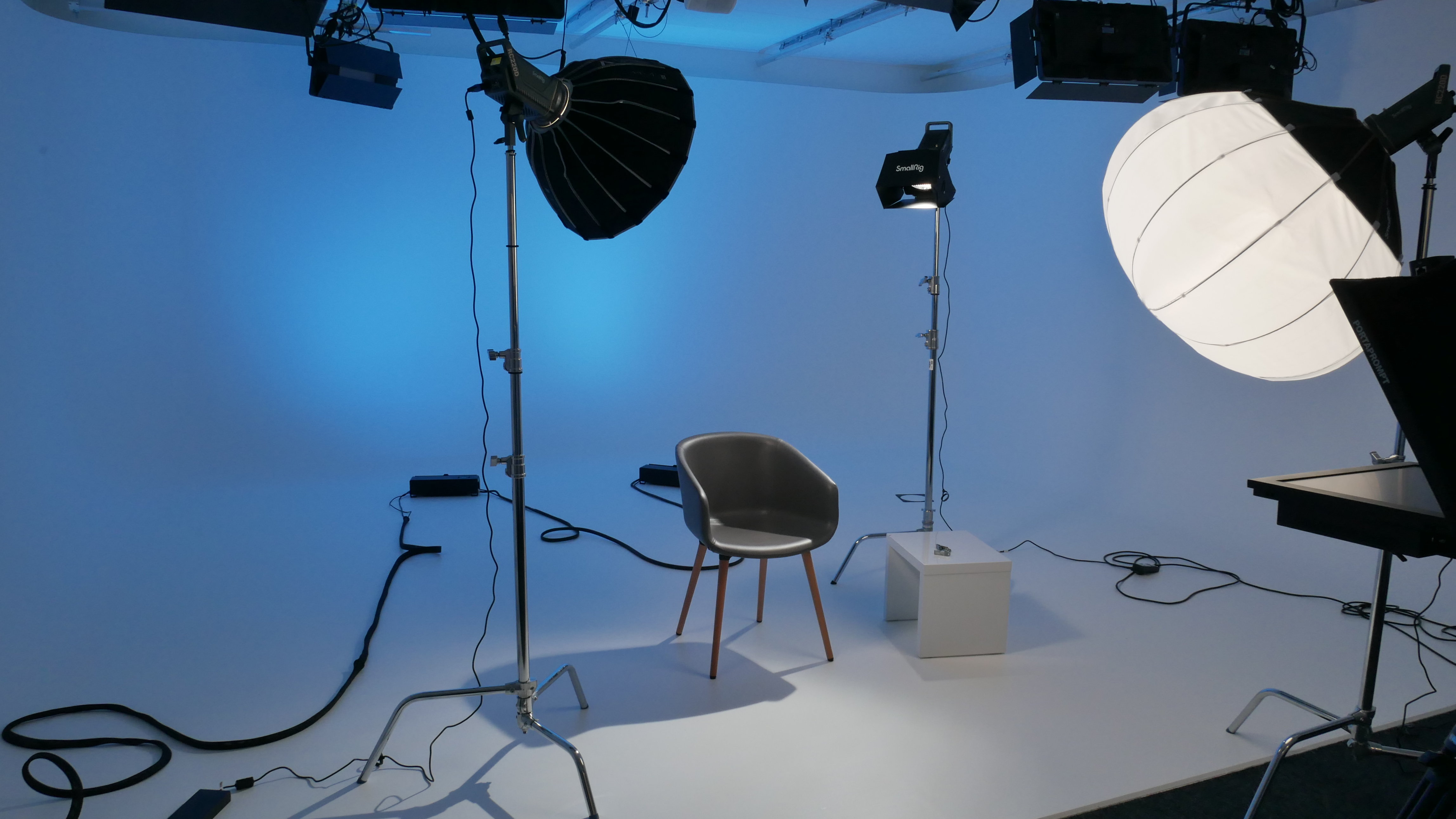 Minimalist digital studio setup for professional interviews and livestreams. - Banner