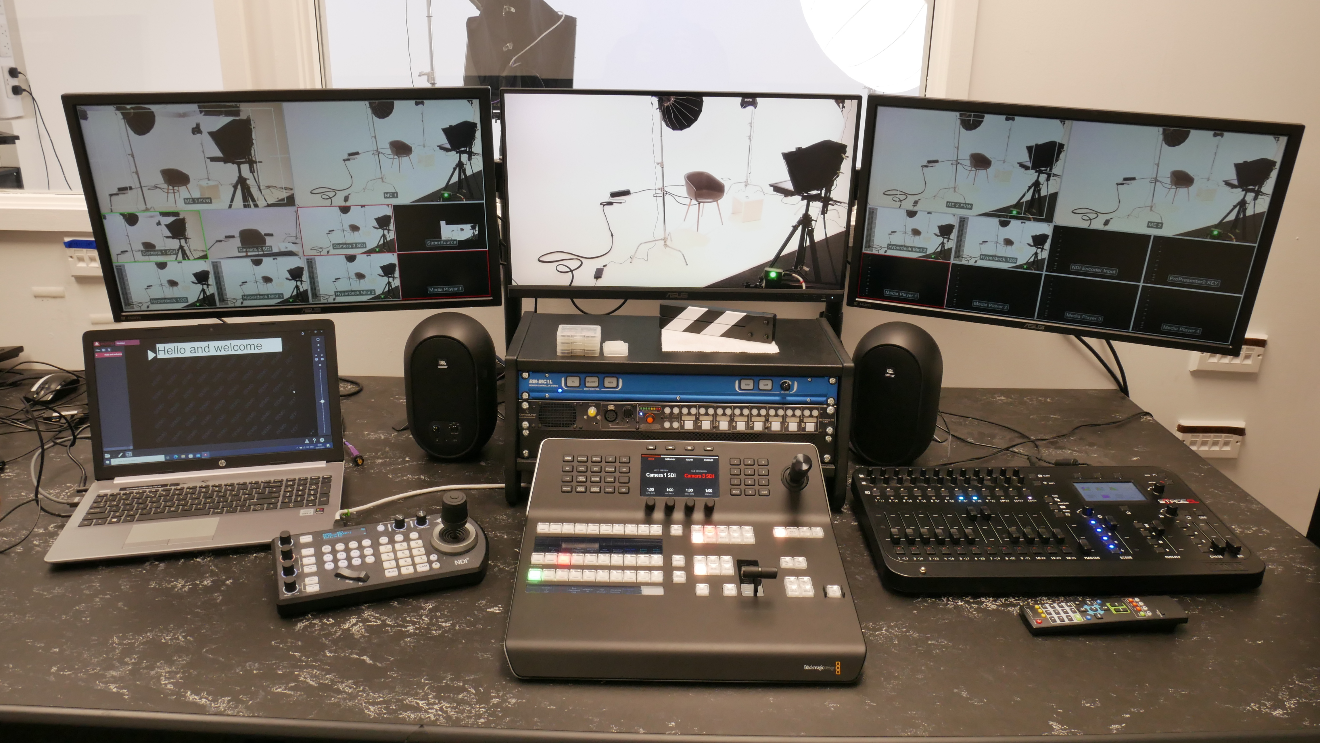 Professional broadcasting setup at Digital Studio, featuring multiple monitors for virtual events.