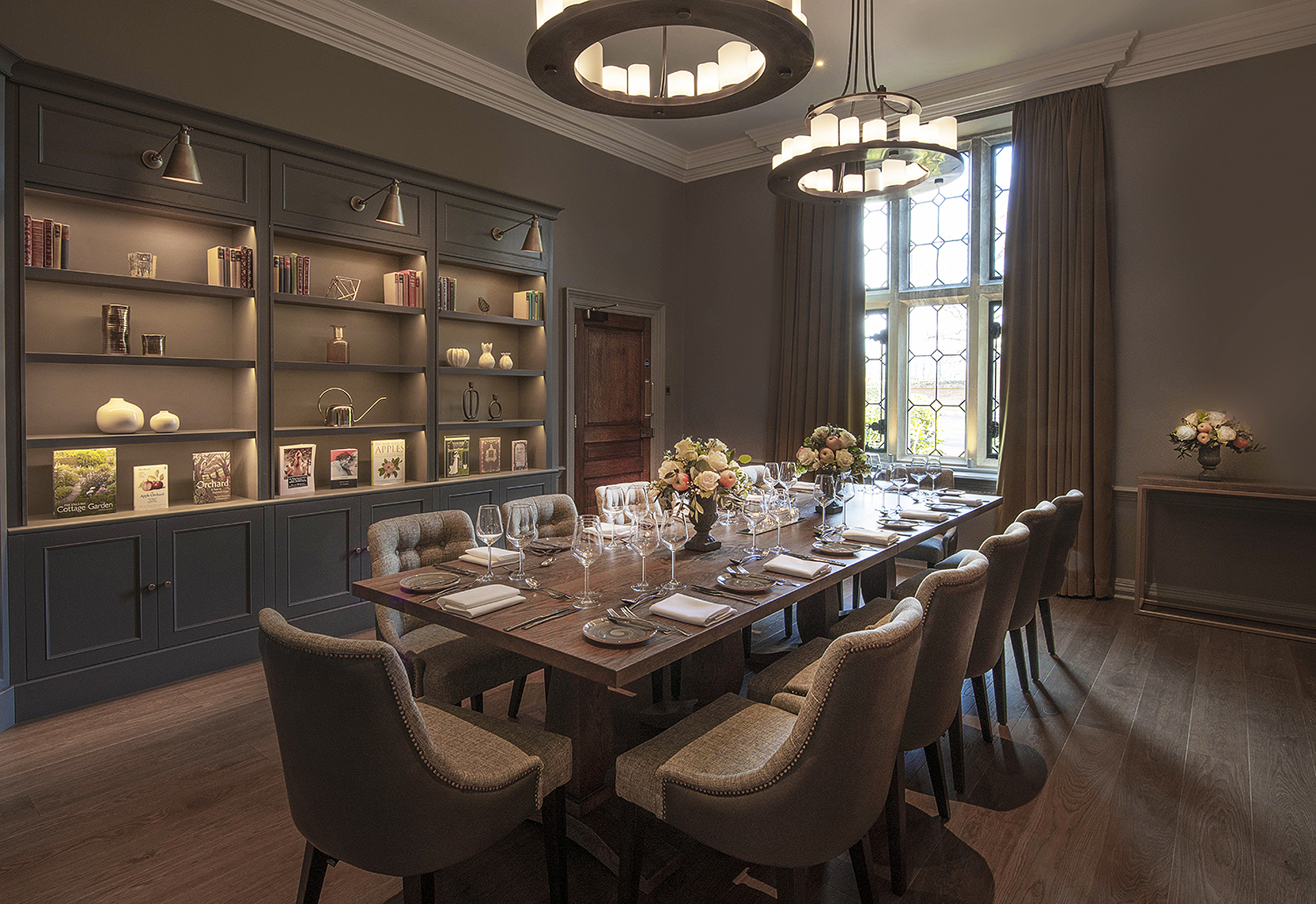 The Manor Library meeting room with elegant decor for intimate gatherings or executive meetings.
