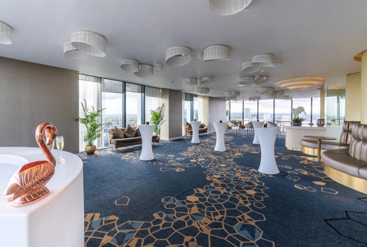 Hilton Manchester Deansgate conference center with skyline views for networking and events.