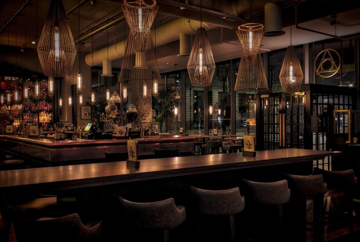 Moody cocktail bar for corporate networking events and upscale business receptions.