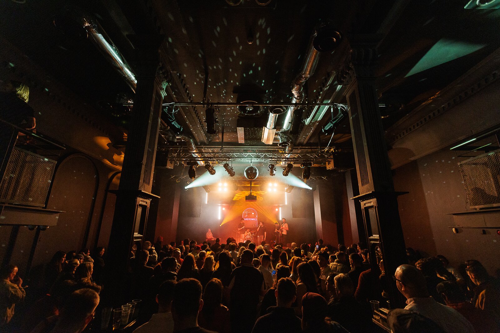 Band on the Wall live venue with immersive lighting, ideal for sold-out showcases and gala events.