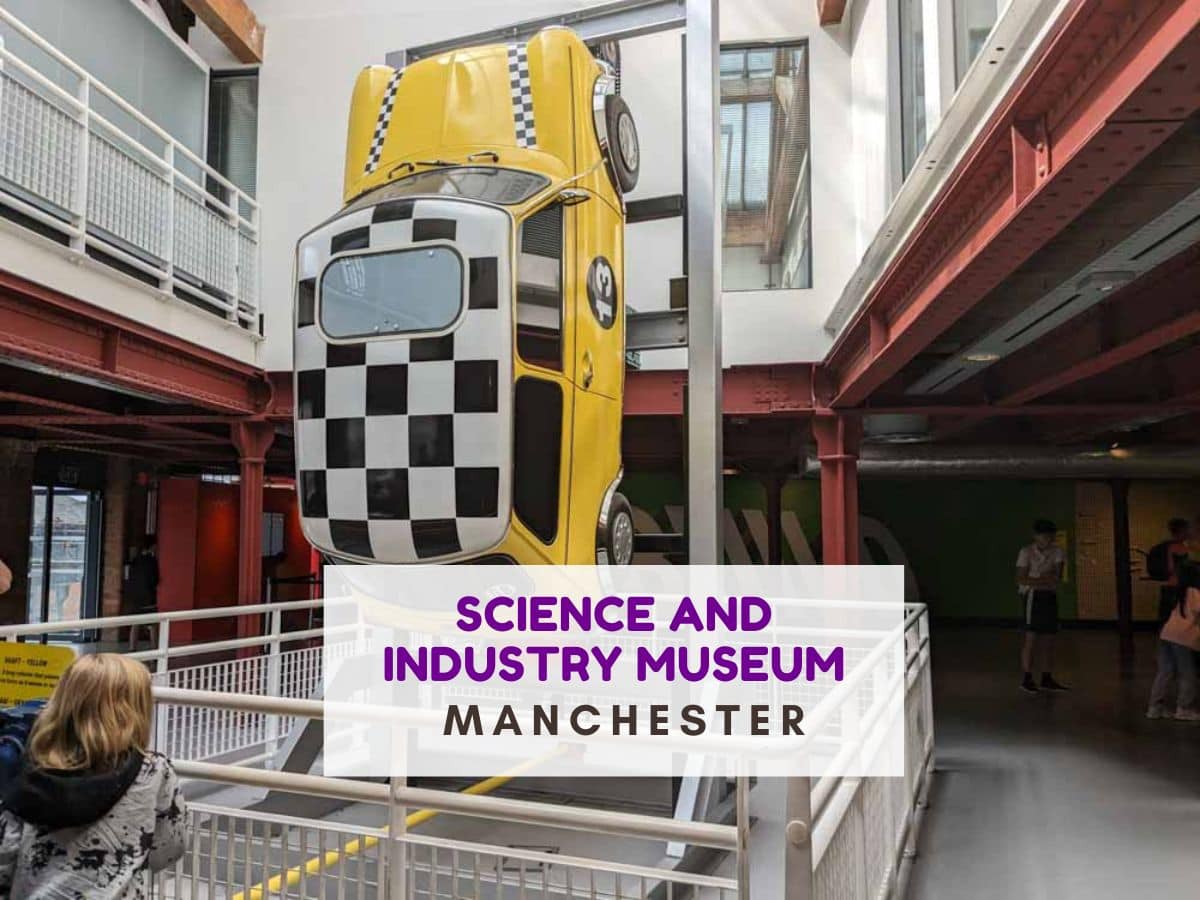 Vibrant Learning Space at Science and Industry Museum with suspended car installation.