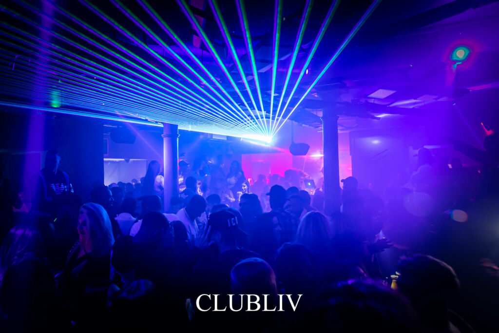 Vibrant nightclub scene at Club Liv with dynamic lighting for lively events and parties. - Banner