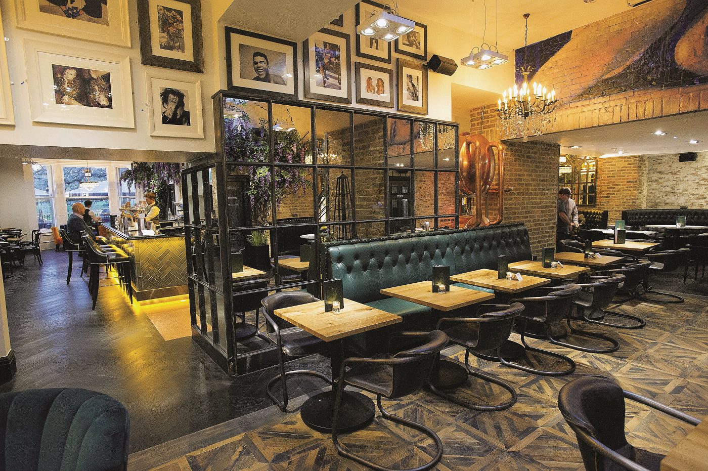 Upscale Black Ivy cocktail bar with booth seating for corporate networking and events. - Banner