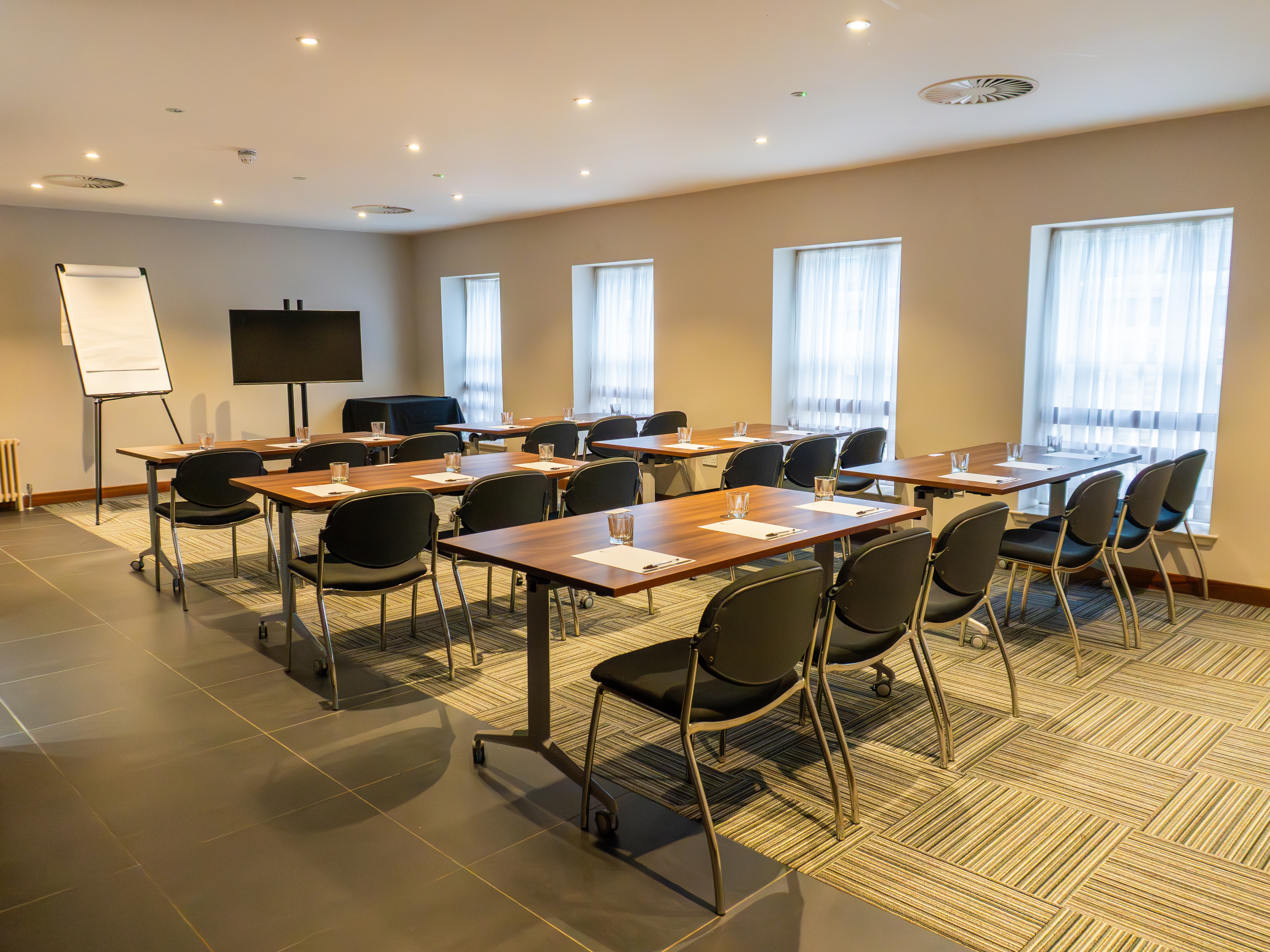 Meeting room at The Baird, The Place Hotel, ideal for corporate events and workshops.