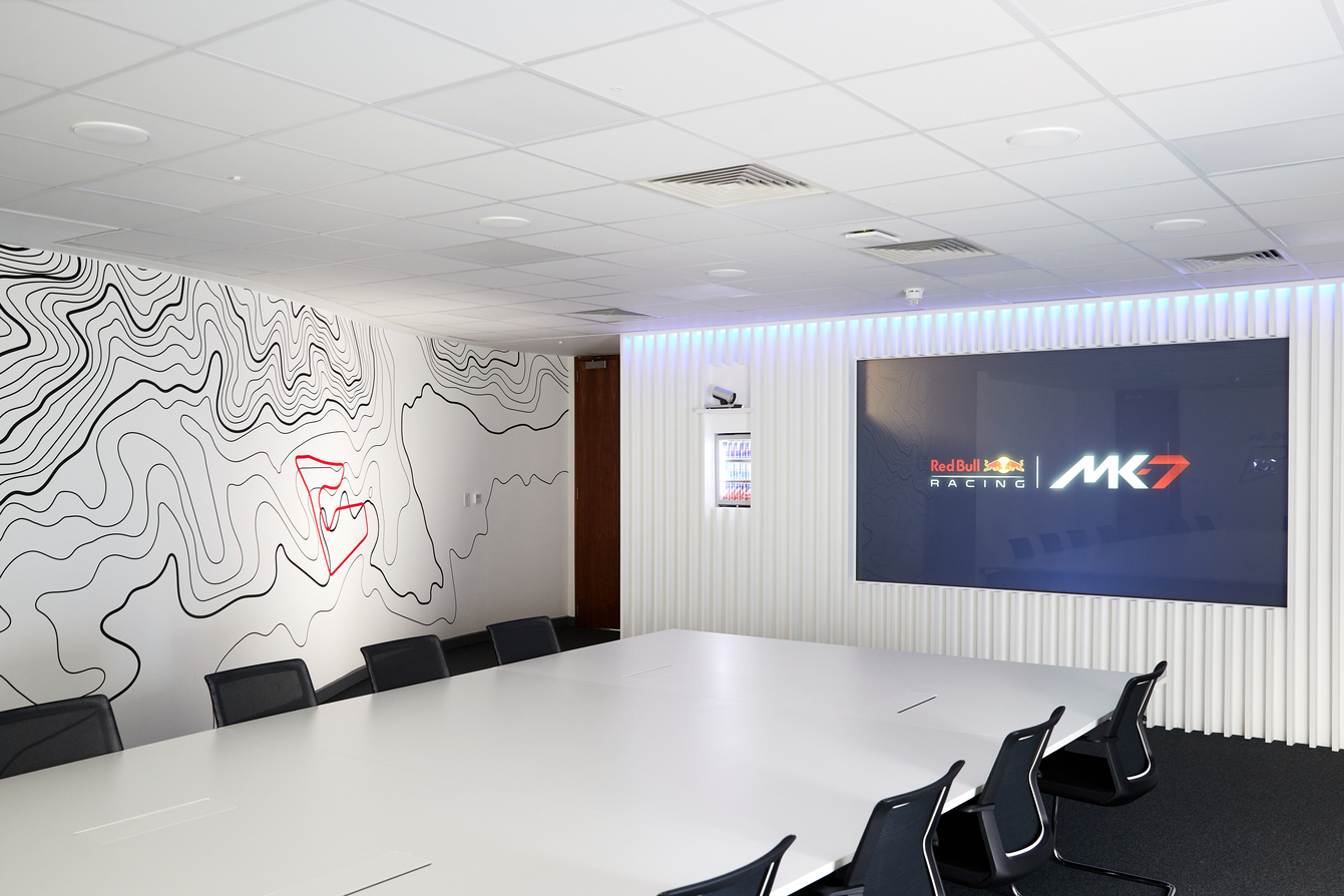 Red Bull Ring Boardroom with sleek table, ideal for professional meetings and presentations.