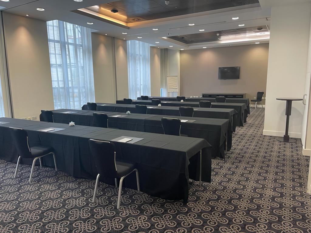 Meeting room setup at Radisson Blu Cardiff for corporate events with polished black linens.