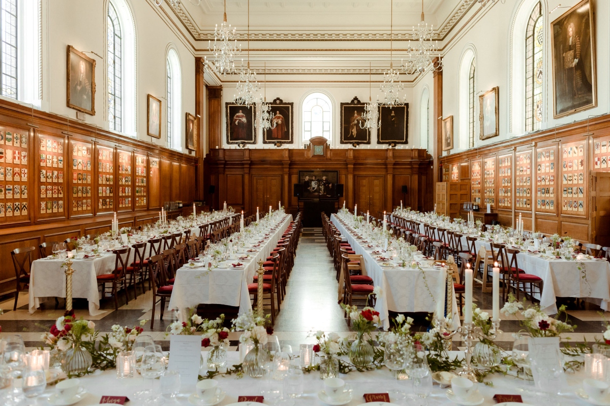 Elegant banquet hall with white linens, ideal for weddings and corporate events.