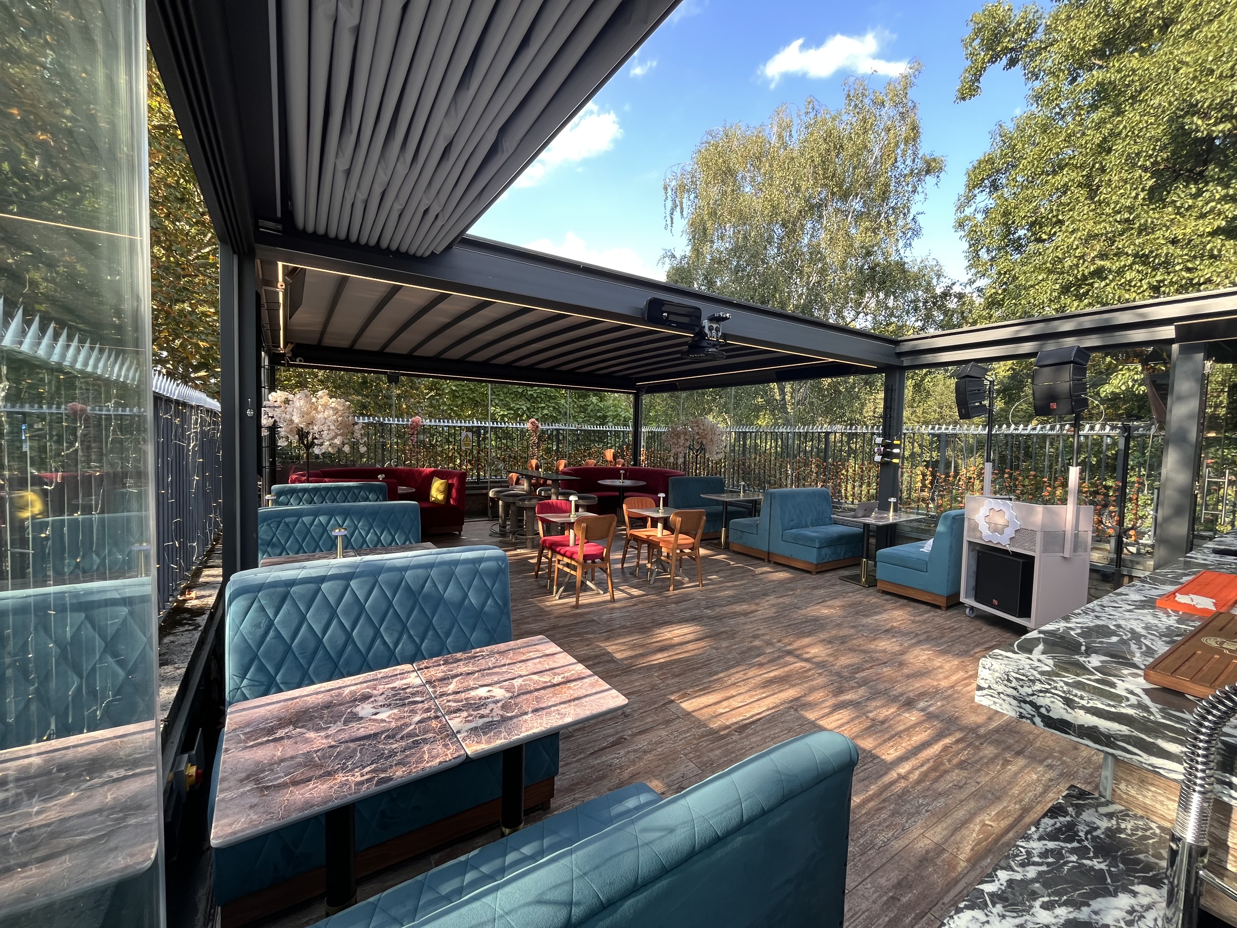 Roof terrace in The Solo, modern seating, perfect for events and gatherings. - Banner