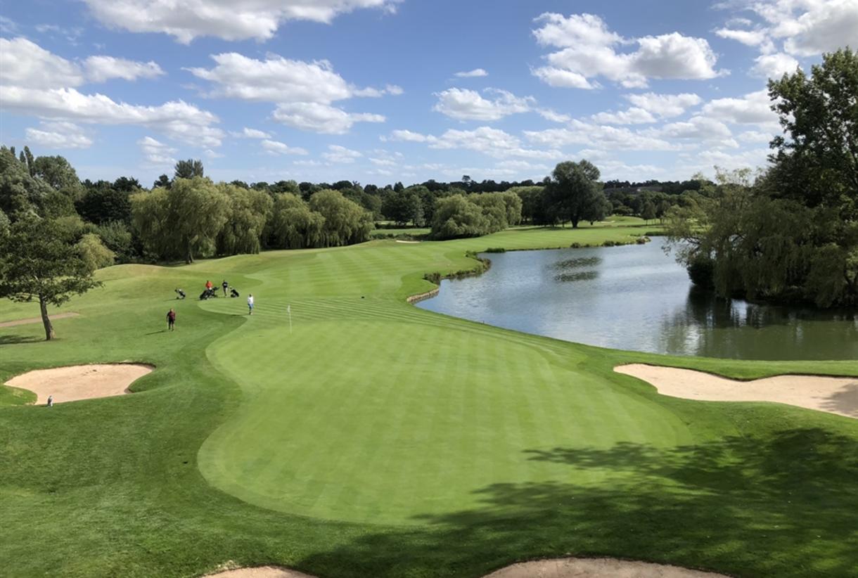 Lush green golf course at The Belfry, perfect for corporate retreats and networking events.