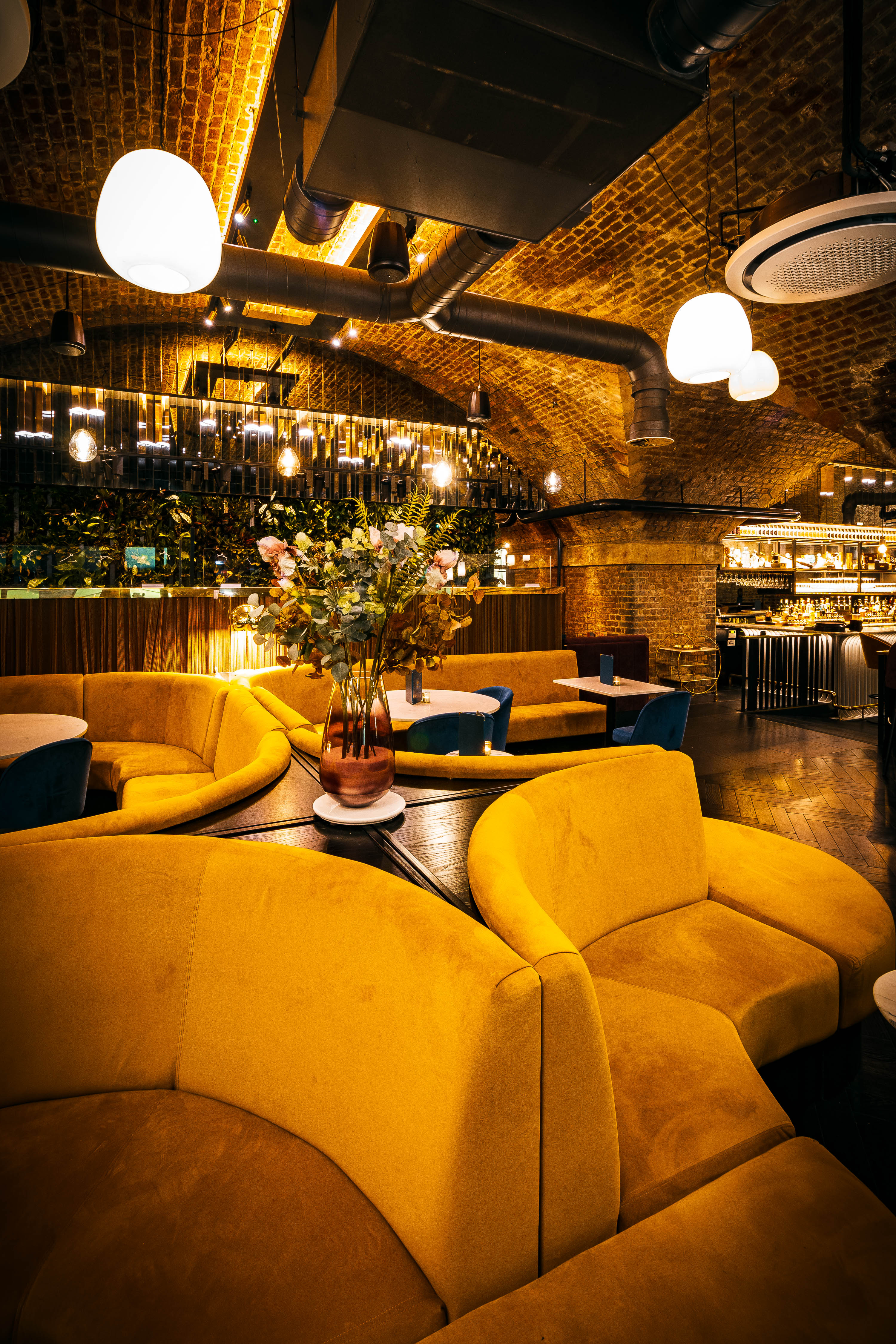 Lounge Arch velvet booths at The Spirit of Manchester Distillery for VIP networking and receptions.