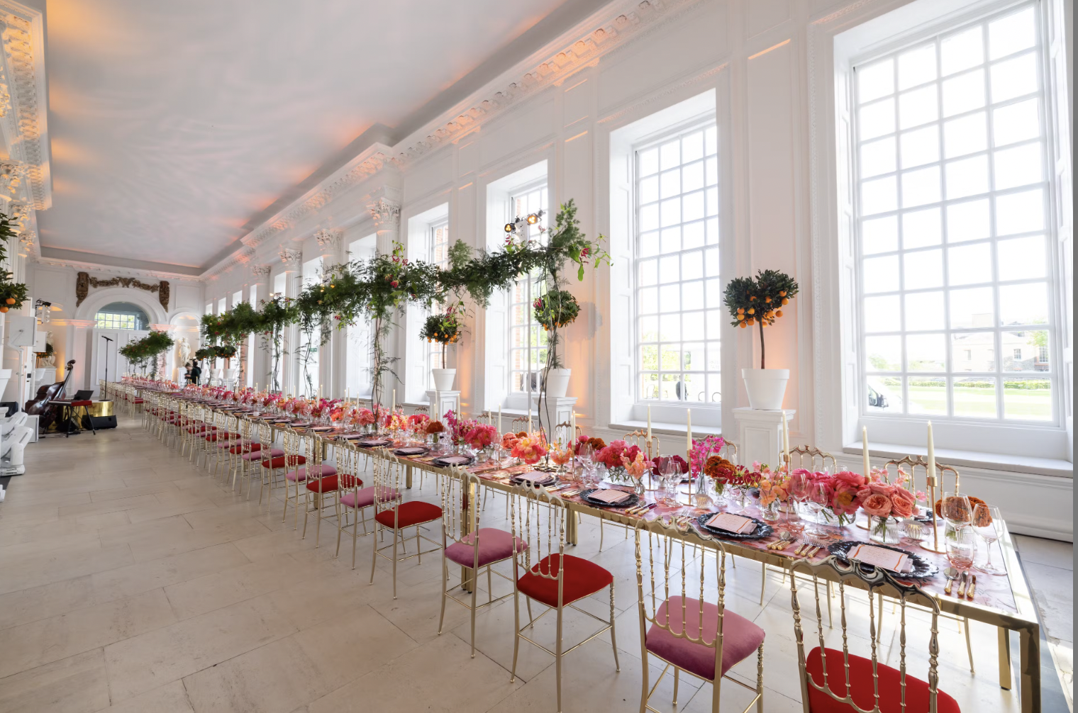 Kensington Palace banquet hall set for weddings and upscale events with elegant decor.