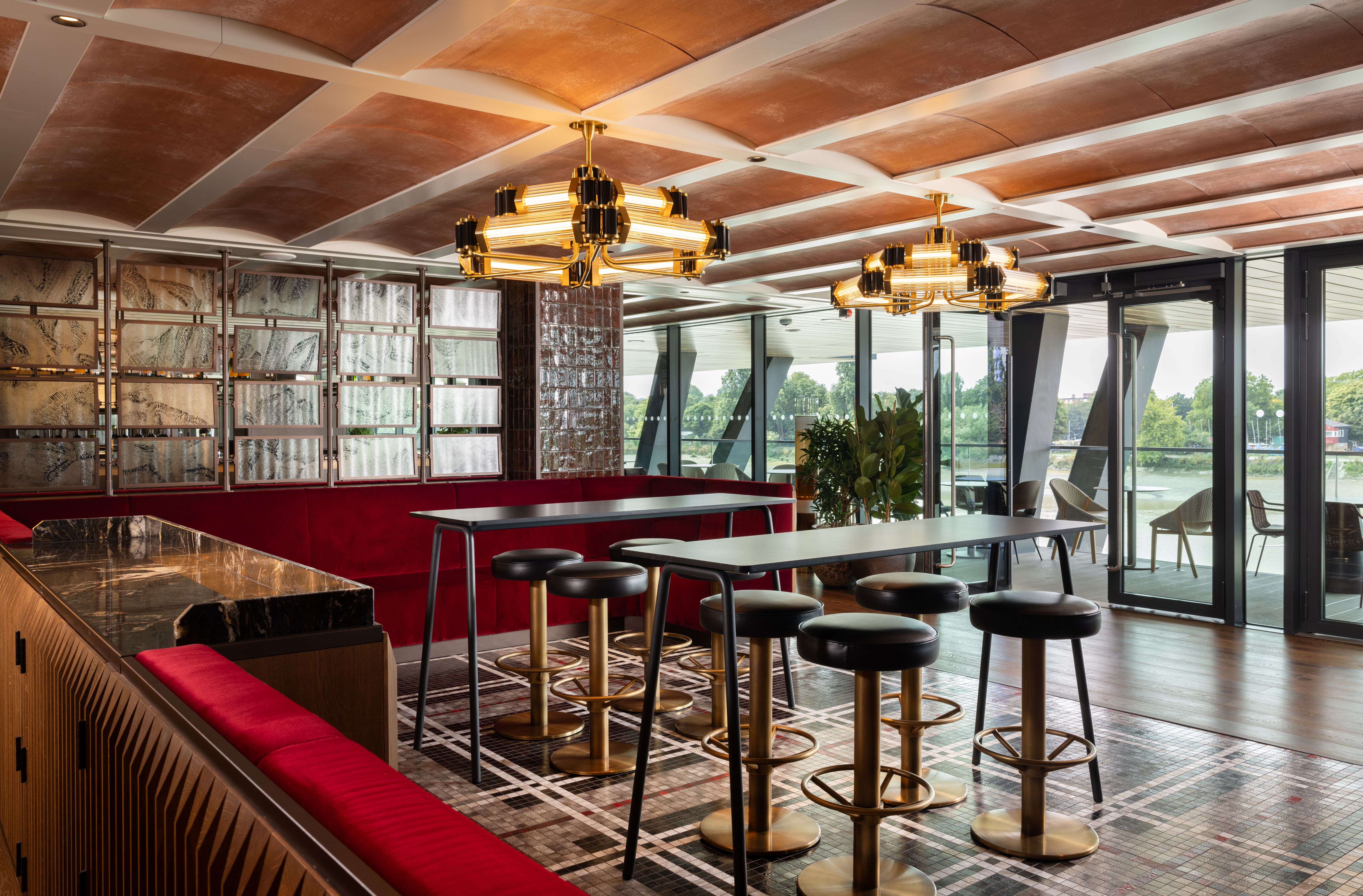 Modern Water's Edge venue in Fulham Pier for cocktail events and meetings. Elegant lighting.