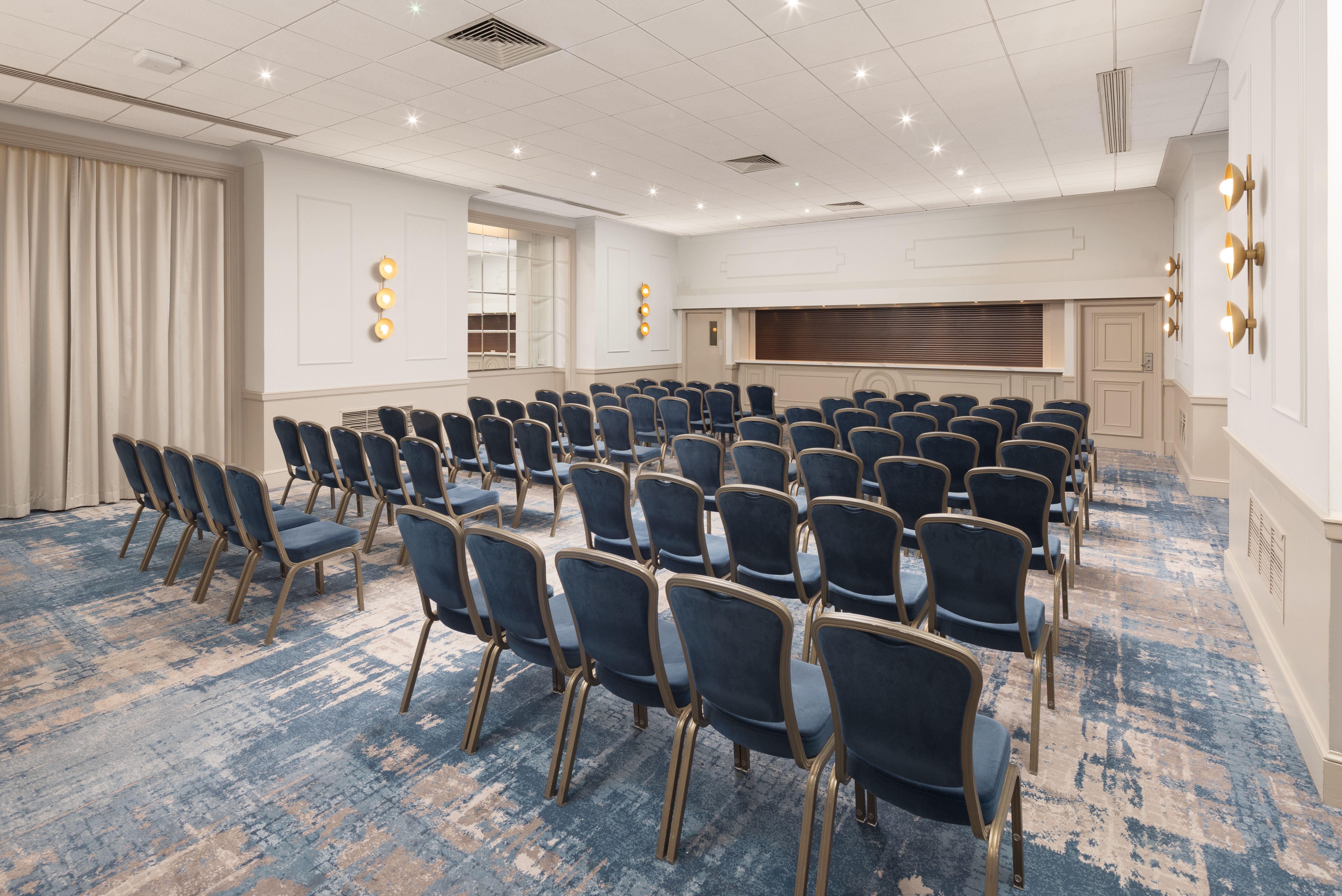 Elegant meeting room at DoubleTree Brighton, ideal for conferences and presentations.